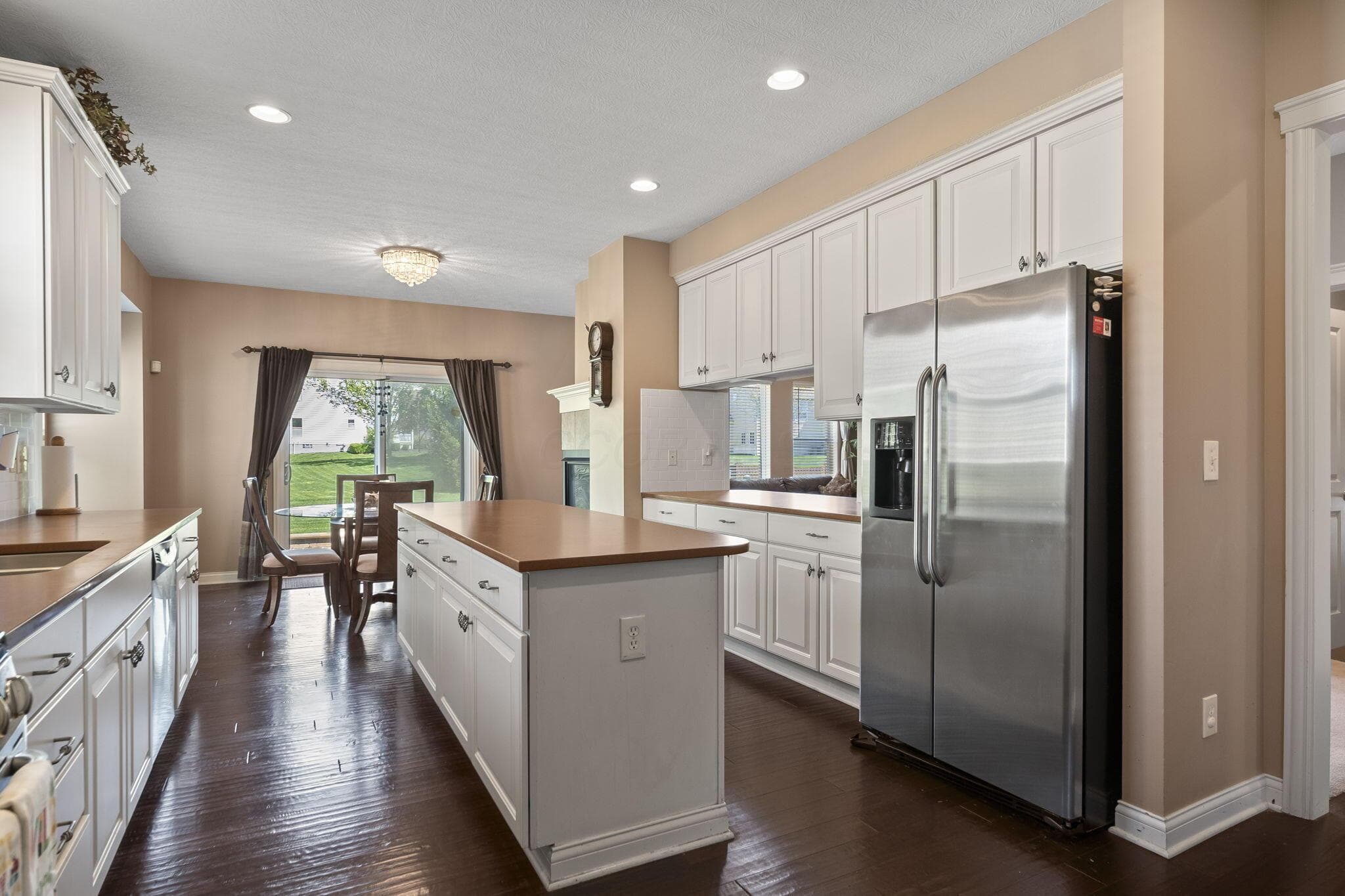 Stainless steel and white cabinets