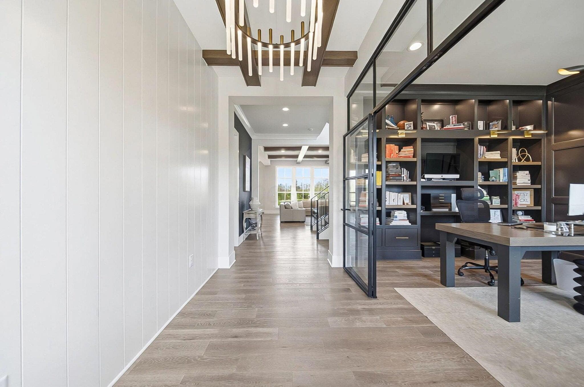 Inviting Entryway. 10' Ceilings on Main Level. Glass-Walled Study.