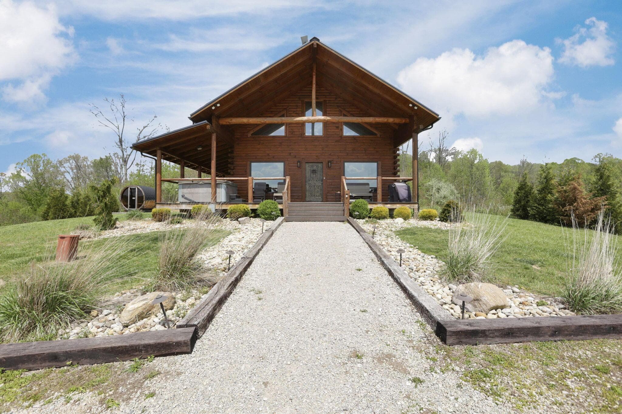Welcome to Shurtz Overlook — a stunning log retreat where craftsmanship, comfort, and scenic beauty come together. Set against a peaceful natural backdrop, this inviting home features rich wood finishes, a spacious covered deck, and the perfect setting for relaxing or entertaining. Whether you’re enjoying quiet mornings or sunset views, Shurtz Overlook offers the ideal blend of privacy and charm.