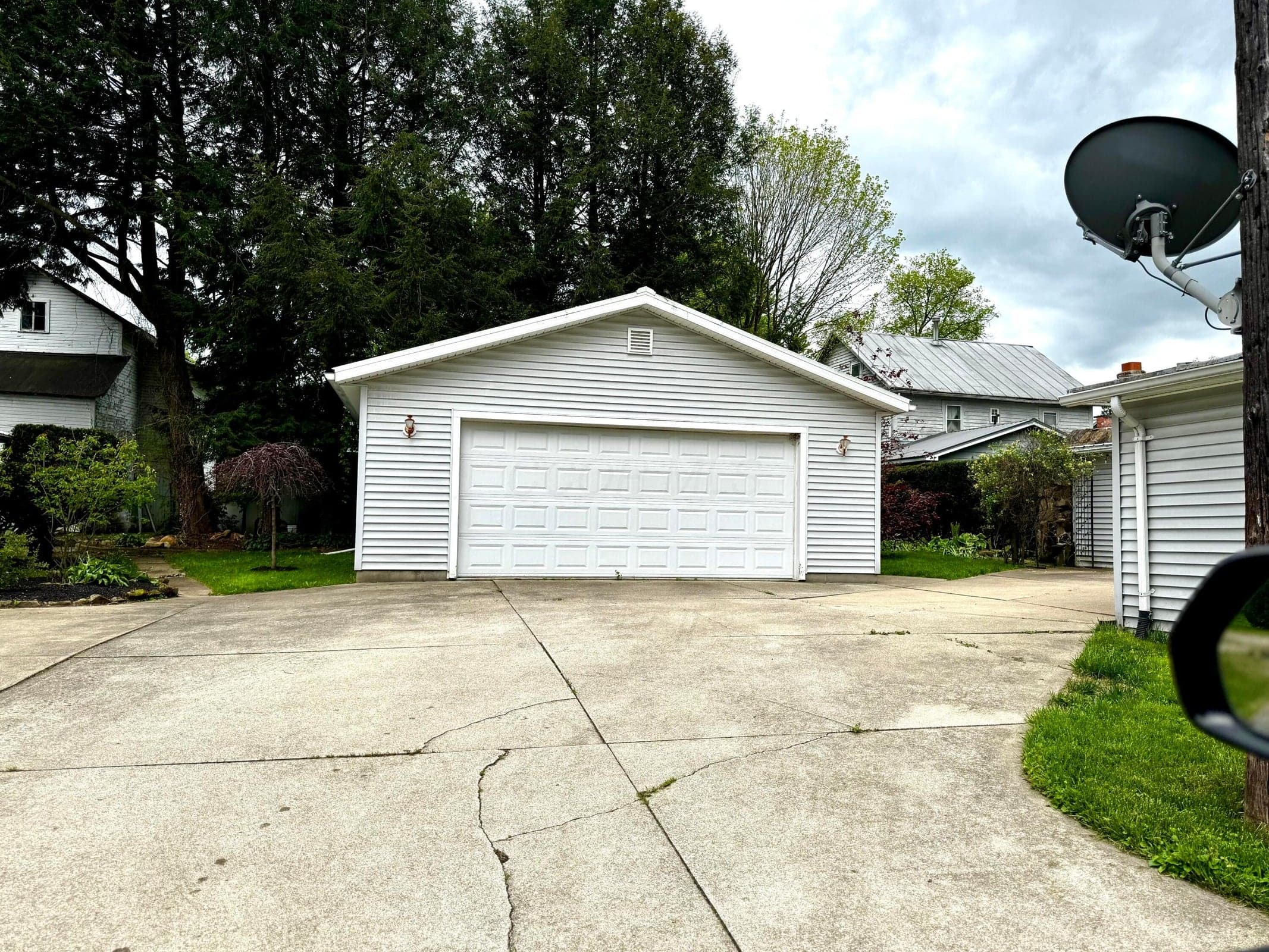 2 car detached garage sits between both houses