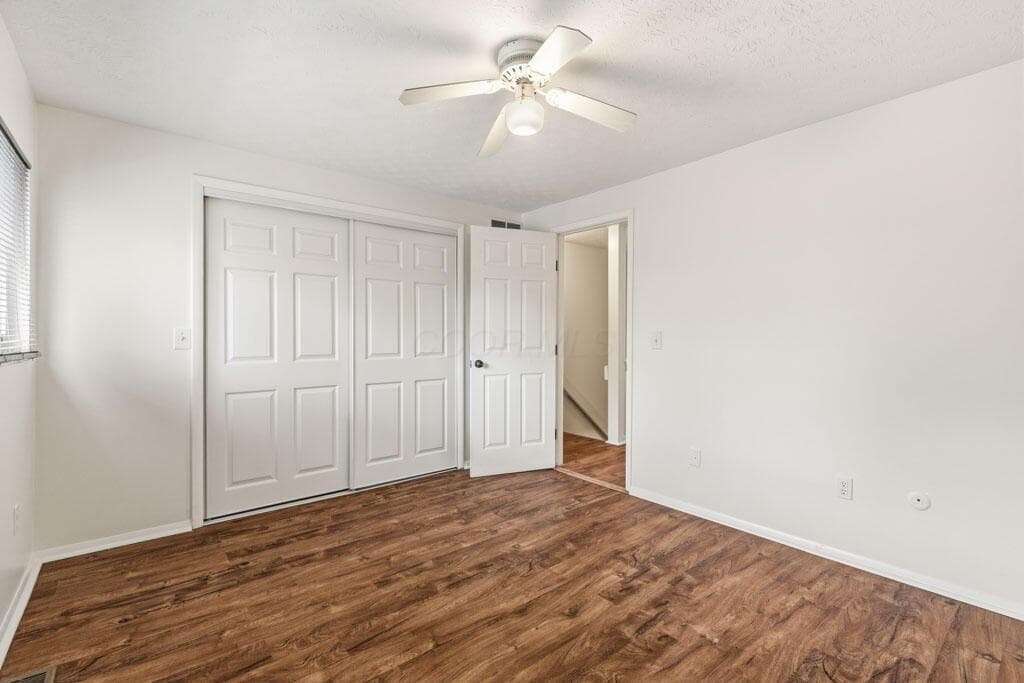 Alabaster walls and vinyl floors.