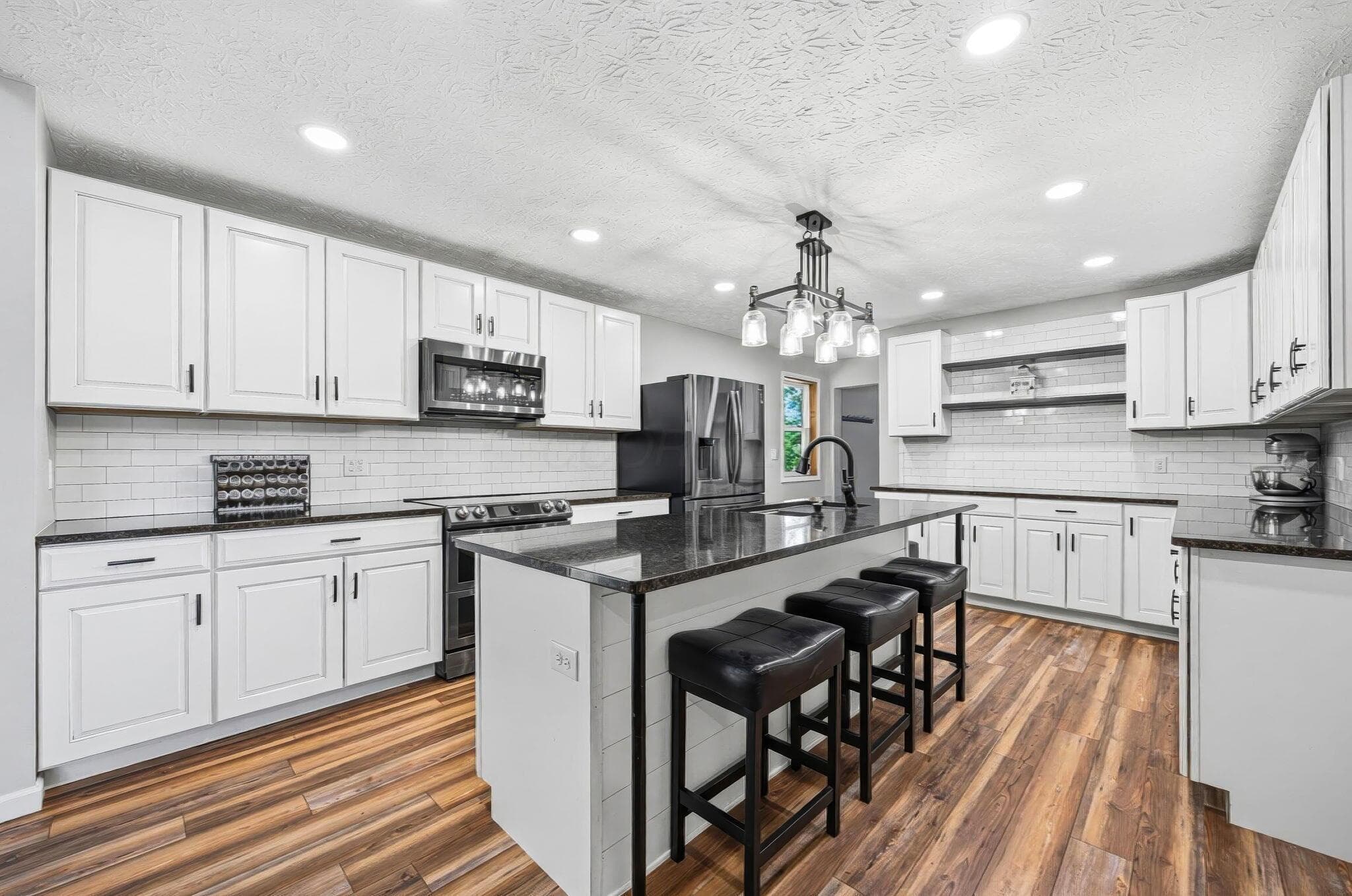 Prep or spend quality time at the large kitchen island!