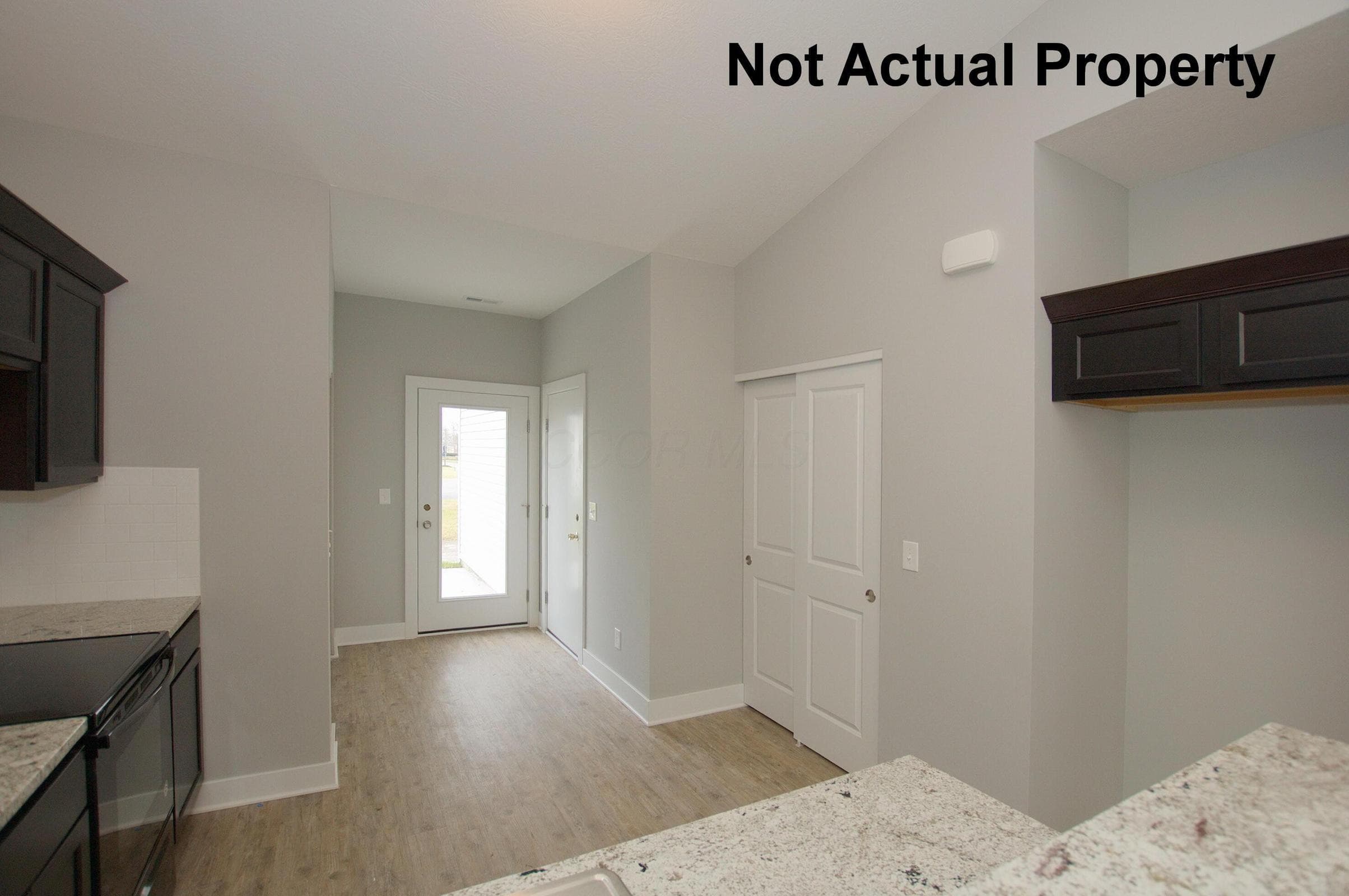The kitchen has a 2-door pantry
