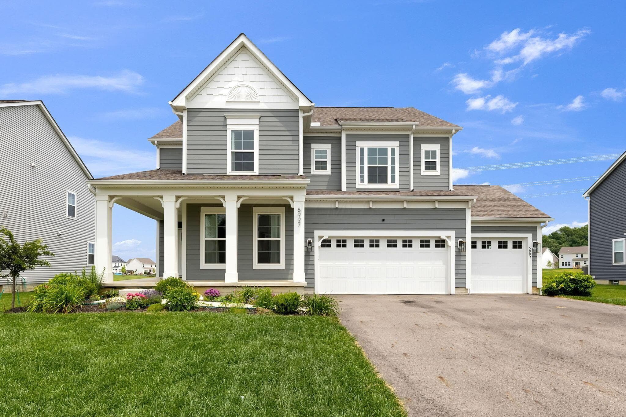Welcome home to 5997 Heather Ridge Drive in Delaware.