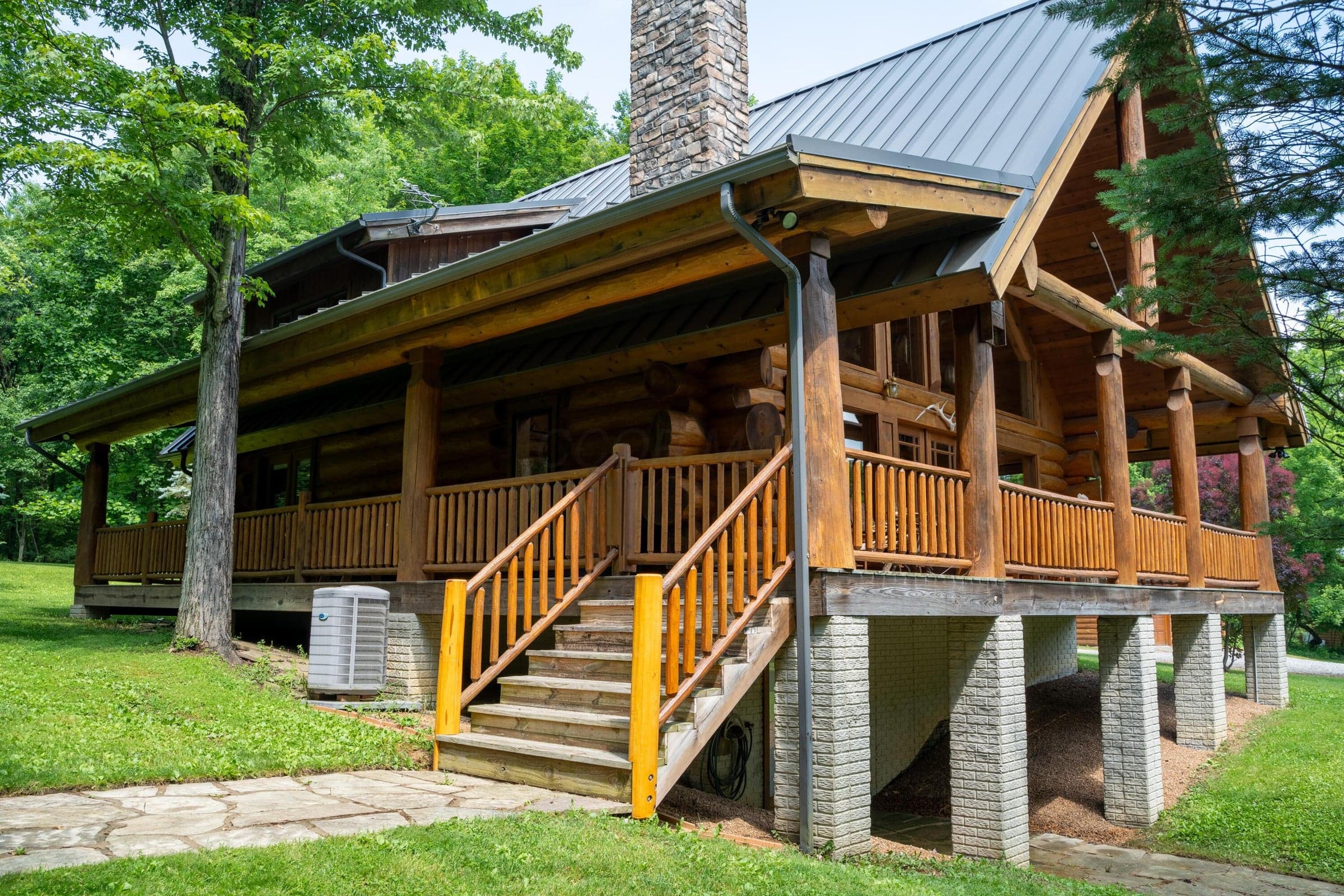 This Beautiful Scandinavian Scribed Red Cedar Log Home Is A Gem. Set In The Middle Of 29.5 Acres Of Manicured Woods It Is A Turn Key Property. All Of The Custom Log Furniture Goes With The Home.