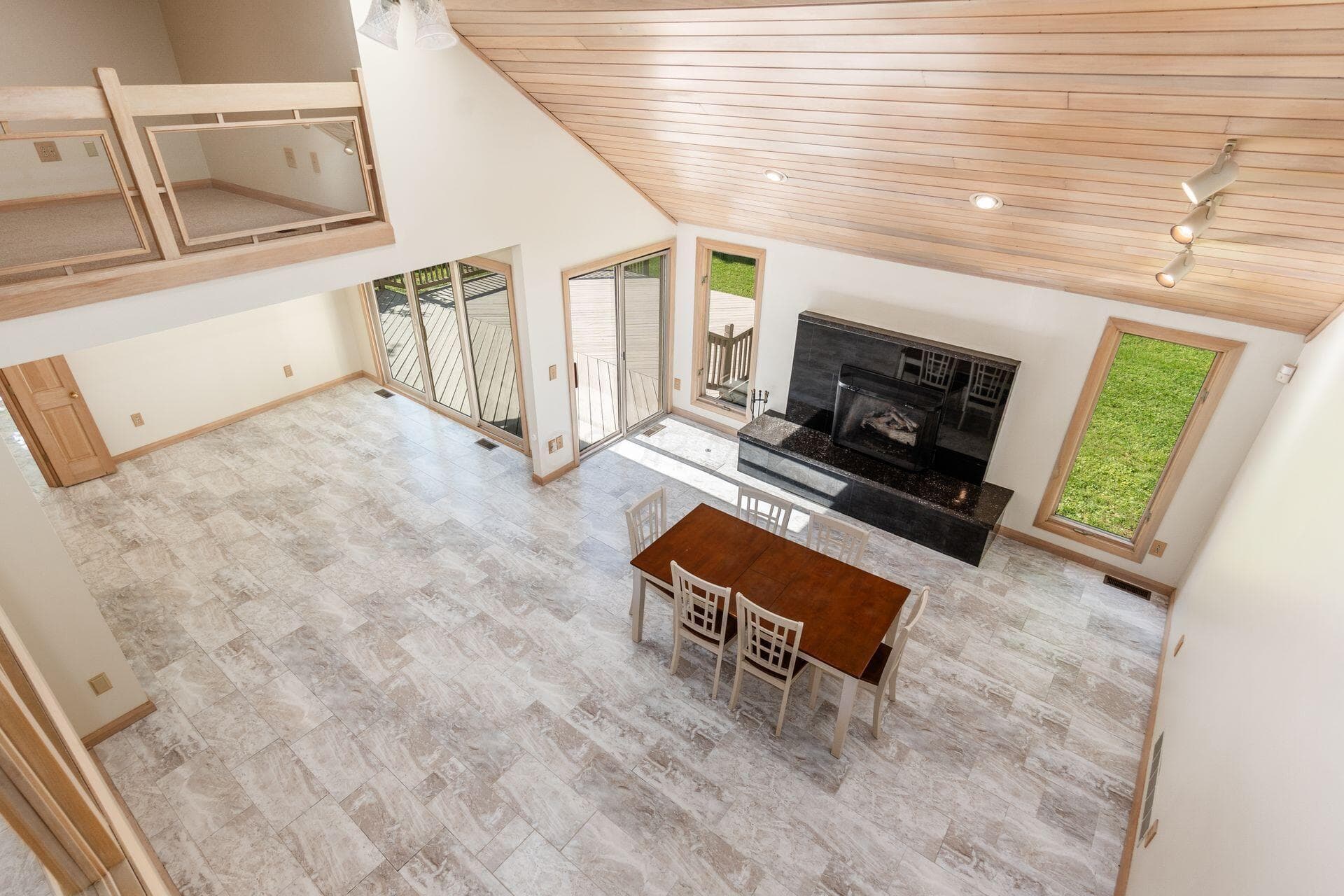 Great room with soaring ceilings filled with natural light
