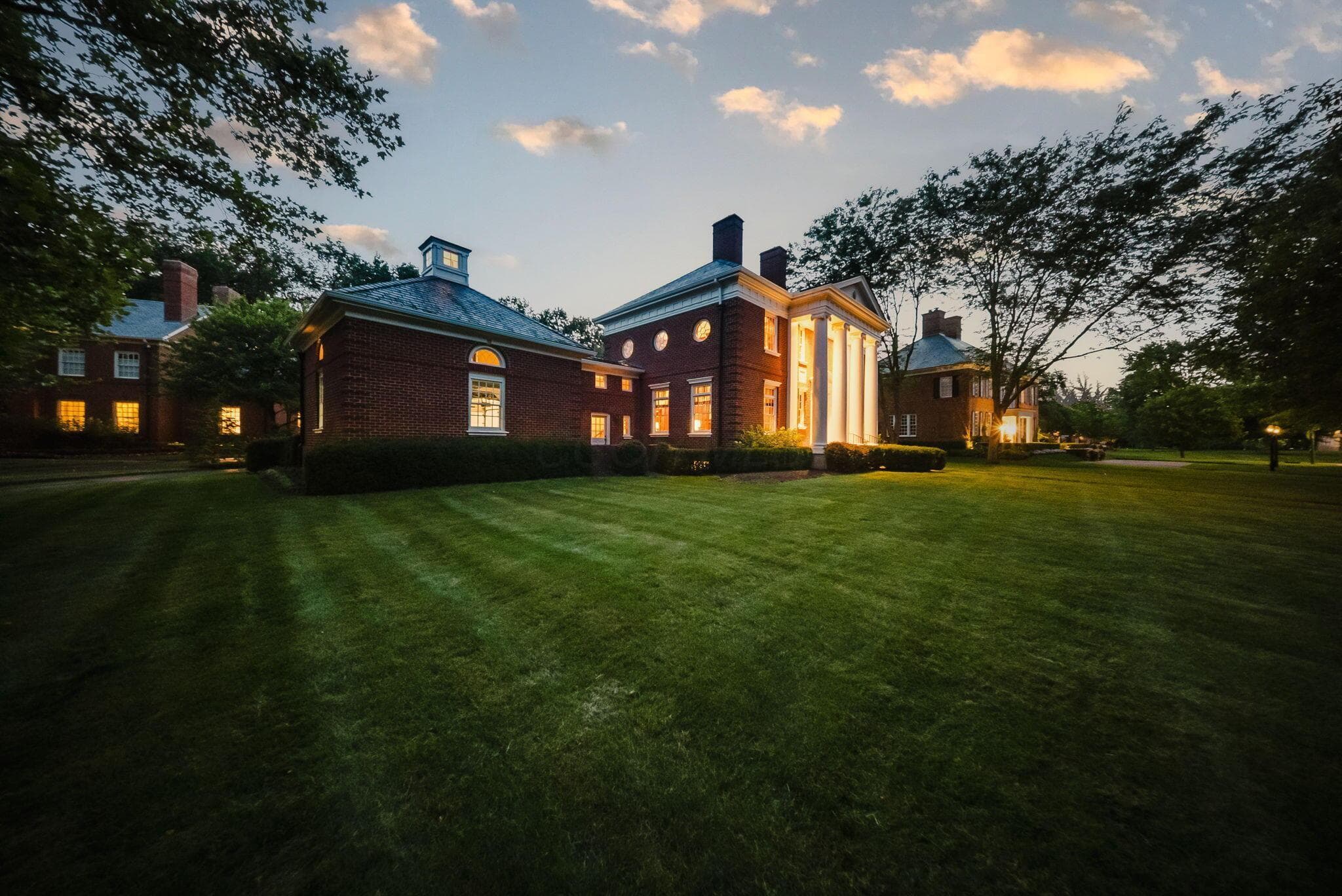 Expansive lawn, mature landscaping and fairway views.
