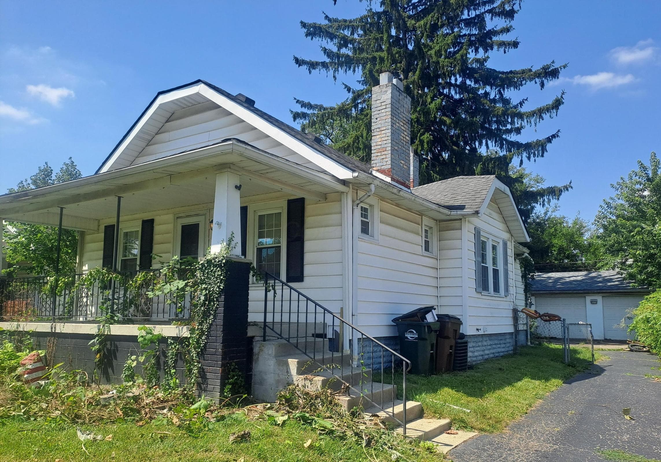 485 N Warren Avenue, up just a few steps will take you to your cozy covered front porch and into your front door.