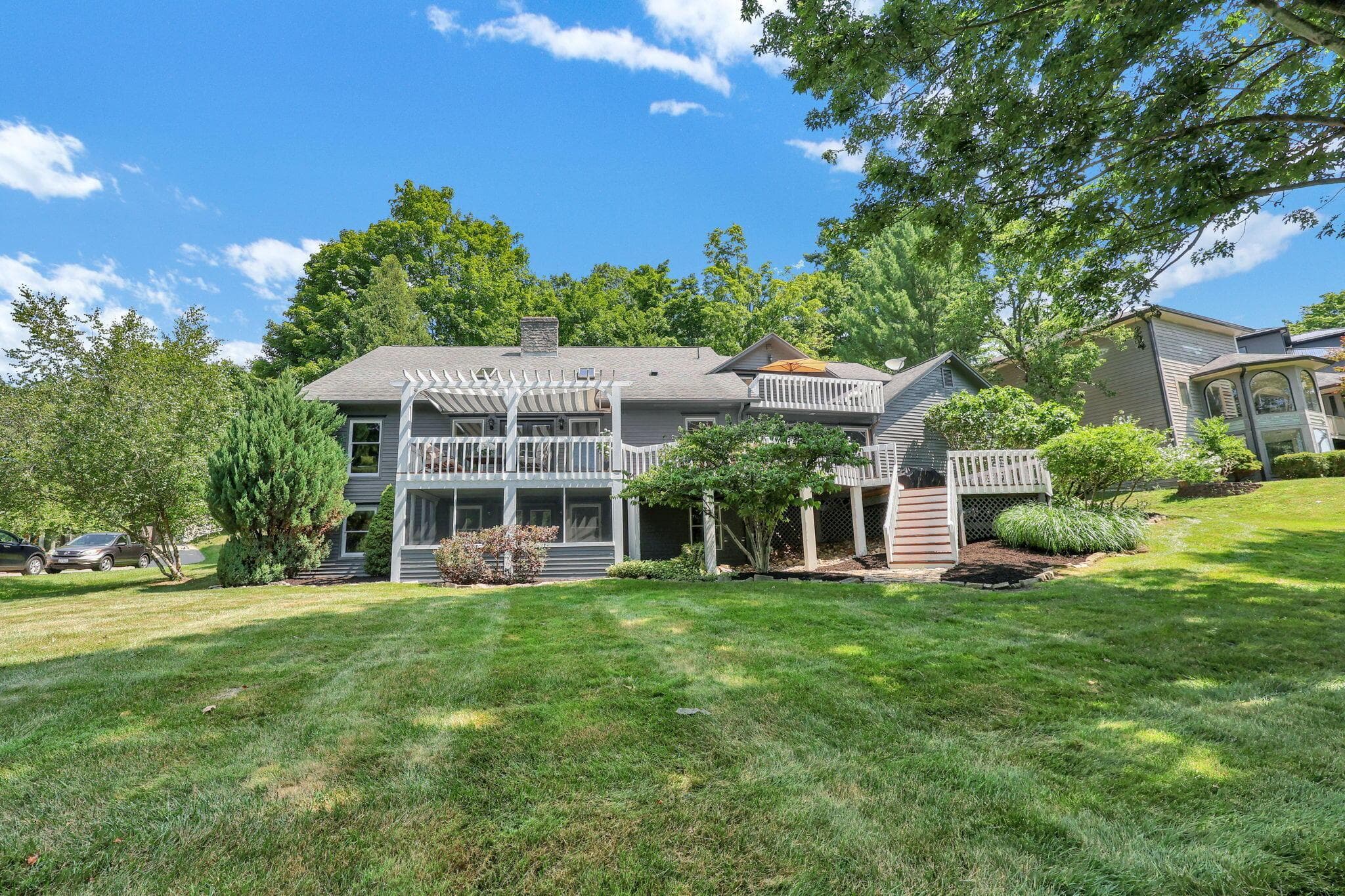 Multiple outdoor living areas to enjoy the views of the Denison Golf Club