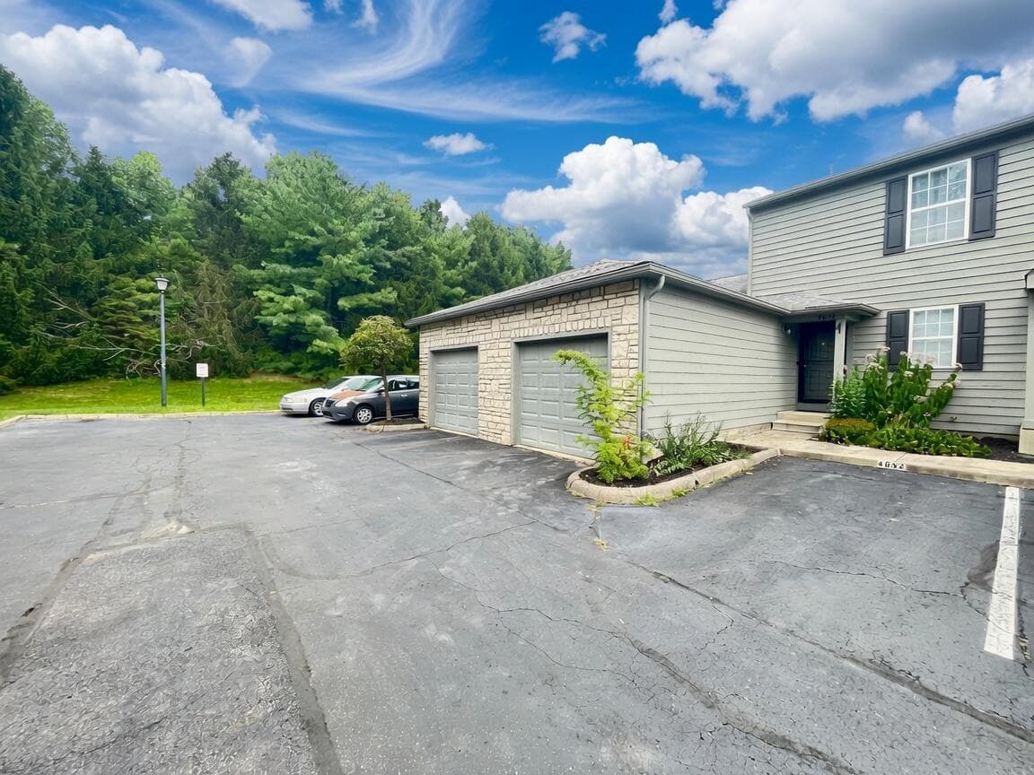 ONE CAR GARAGE AND ONE ALLOCATED PARKING SPOT