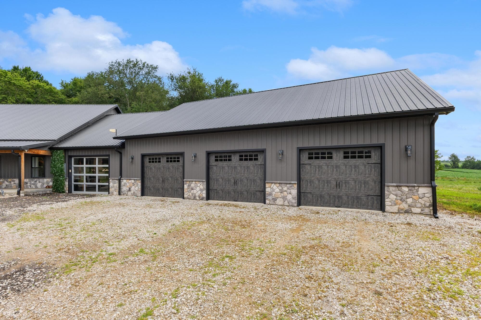 3 Bays and a Tandum garage with pull through door in back. Everything was thought of.