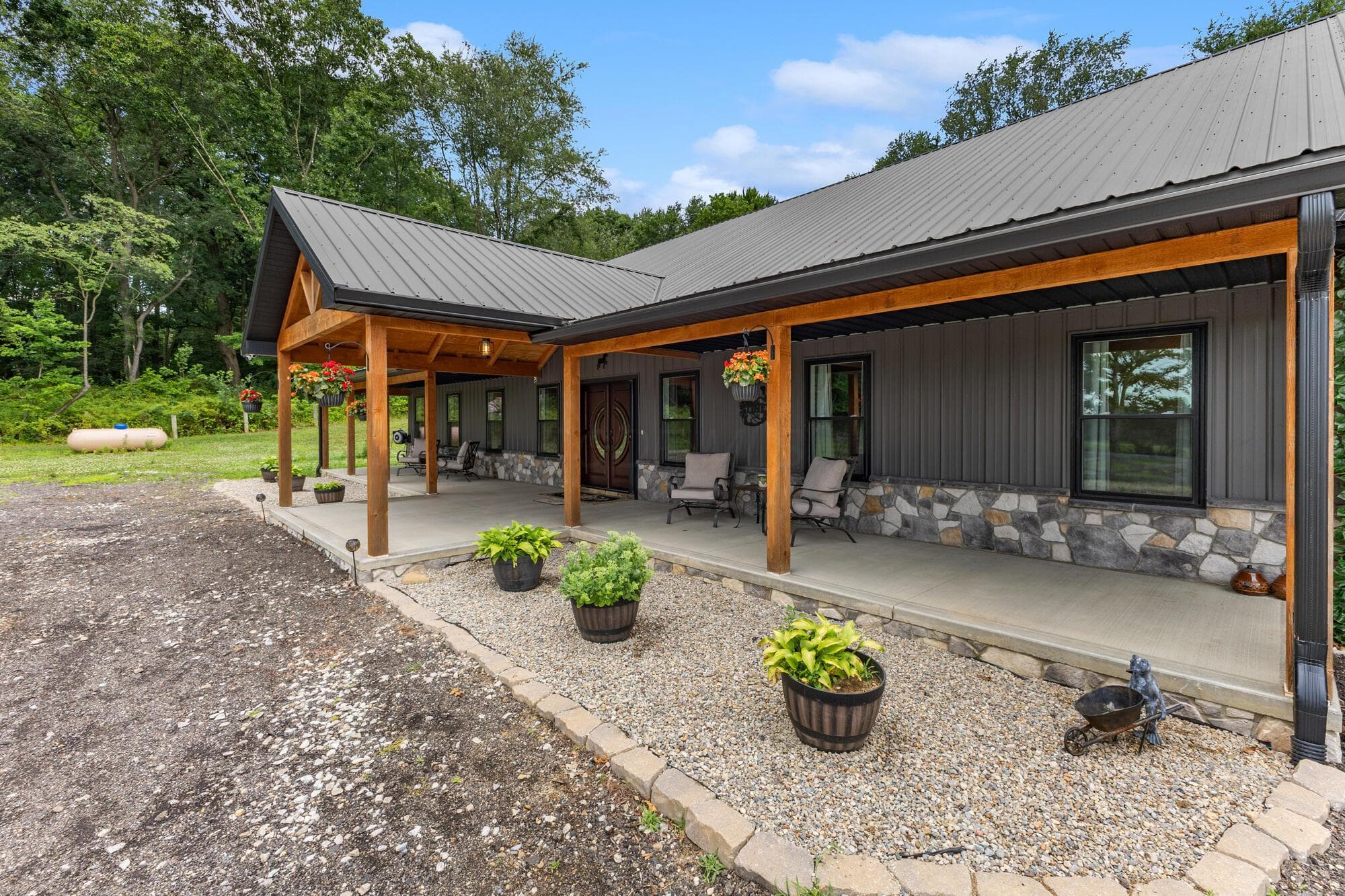 This porch is stunning and strategically placed to hang out all afternoon and enjoy the view.