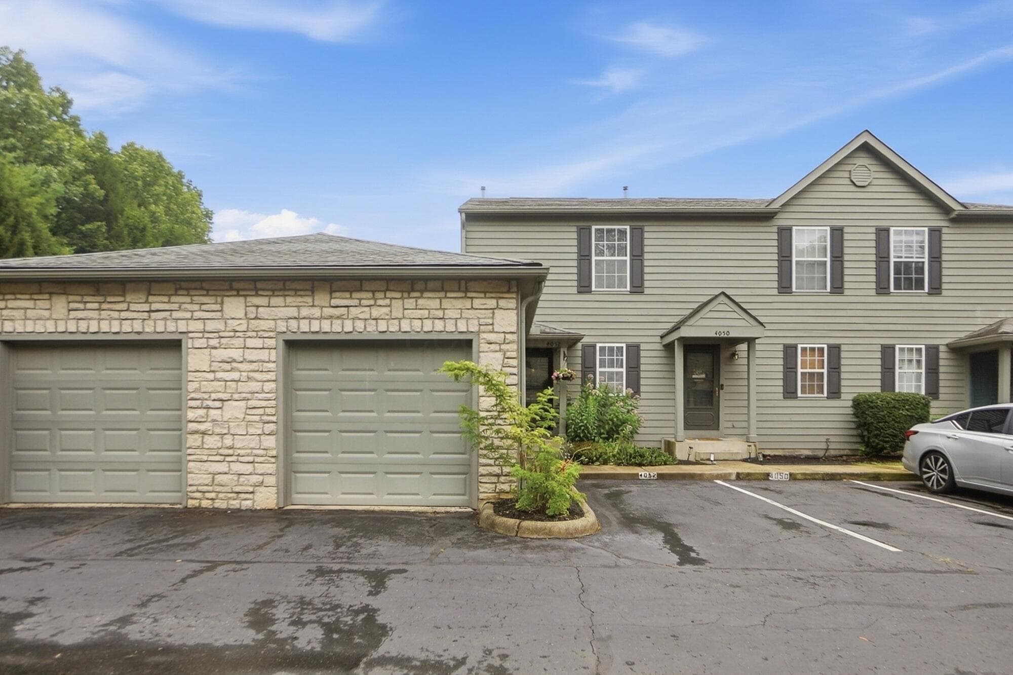 ONE CAR GARAGE AND ONE PARKING SPACE