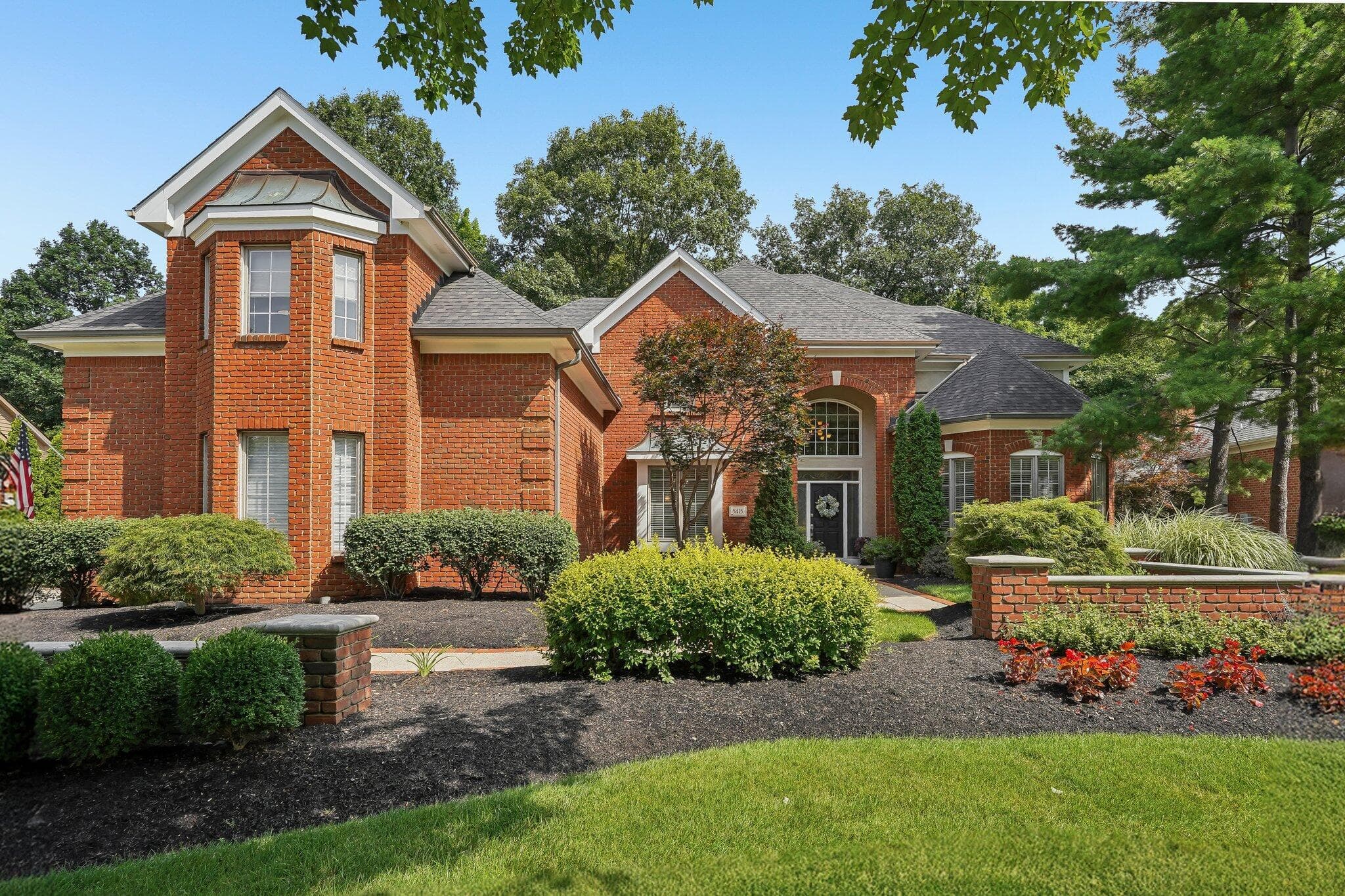 Welcome home to this beautifully maintained brick residence featuring timeless architecture, manicured landscaping, mature trees, and exceptional curb appeal.
