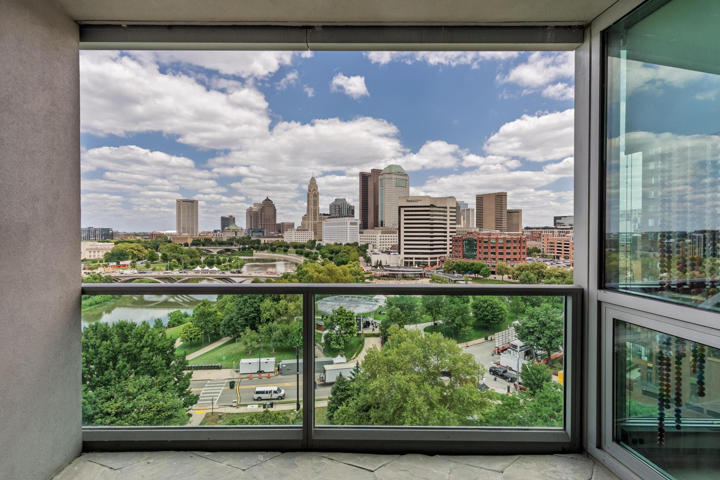 Private balcony overlooking downtown Columbus. 10'6" x 5'7" ( + - )