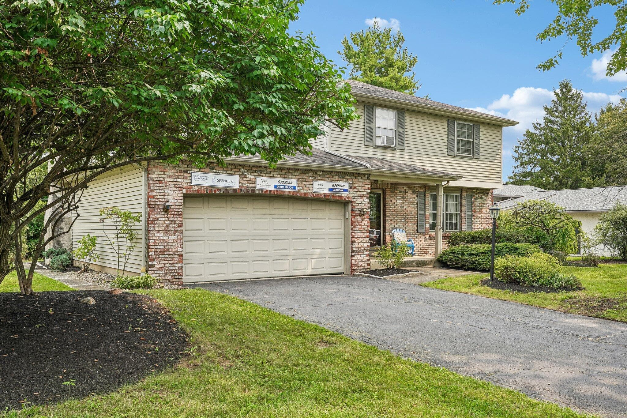 2 car garage with EV charger, covered front porch