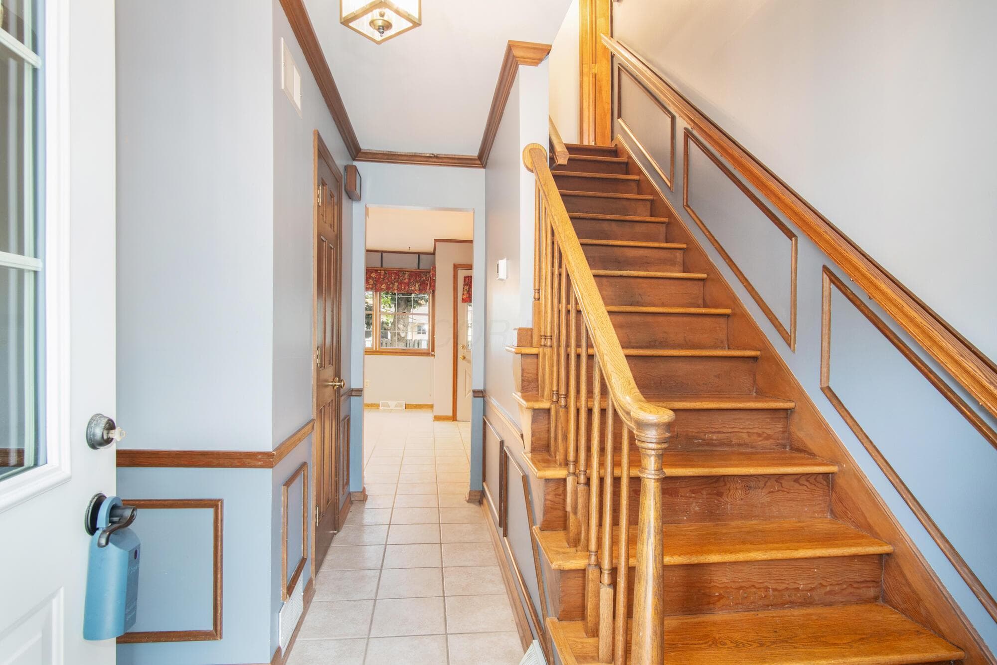 Ceramic tile. Access to Guest 1/2 Bath & Flex Front Room which could be 1st Floor Office or 5th Bedroom.