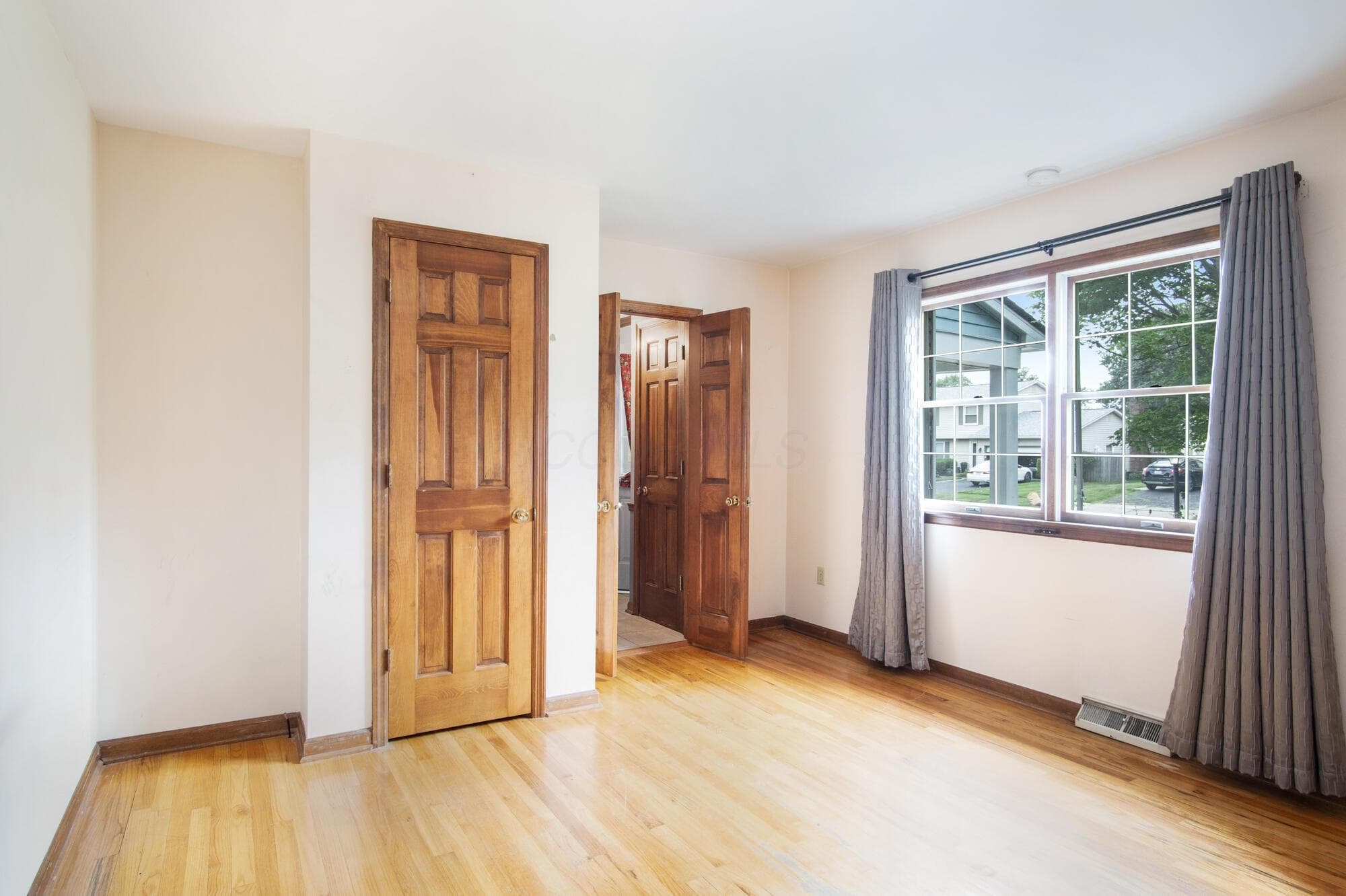 13.10 x 12.1 This Flex Room offers French door access and a closet.