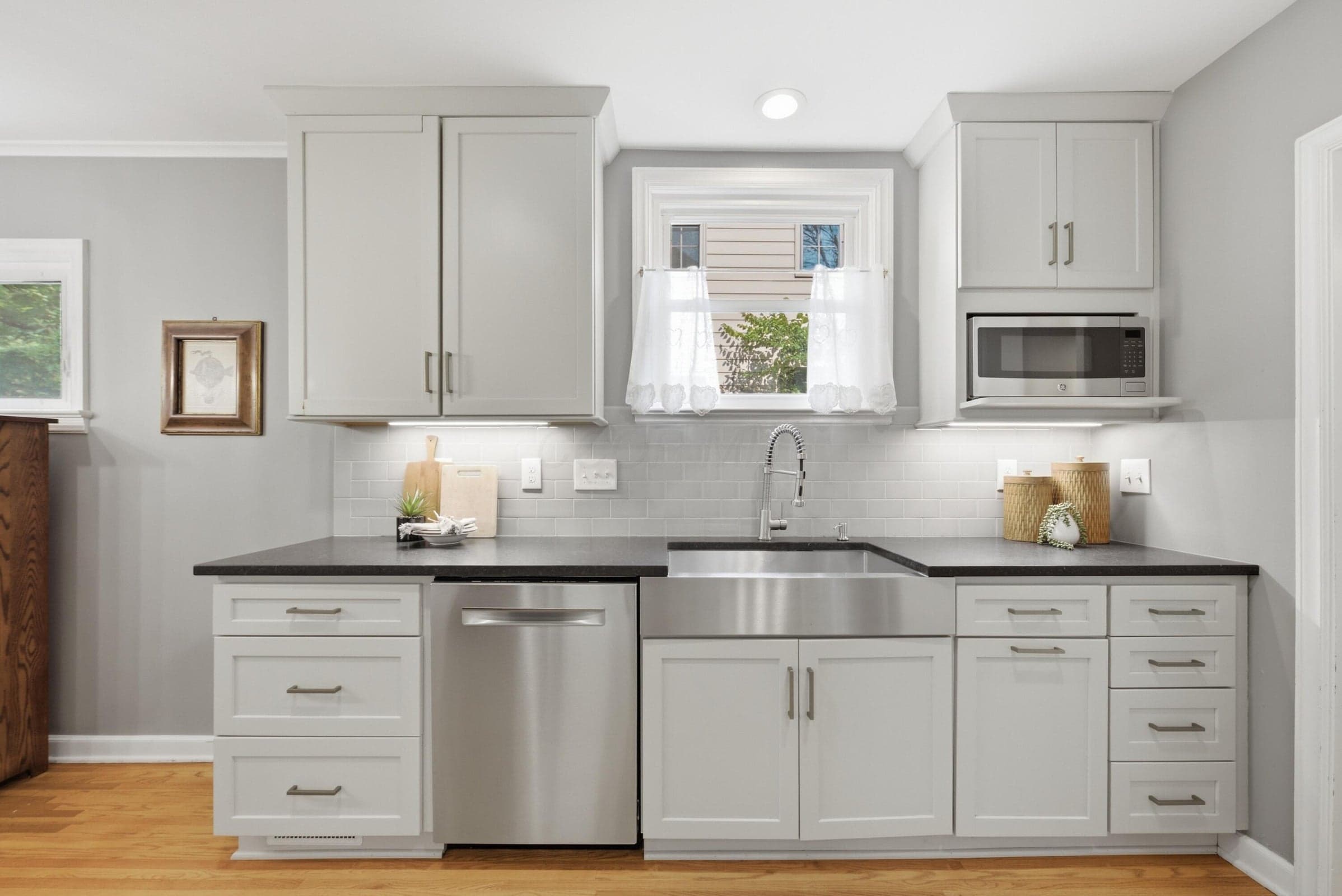 Bright window over the kitchen sink, granite countertops
