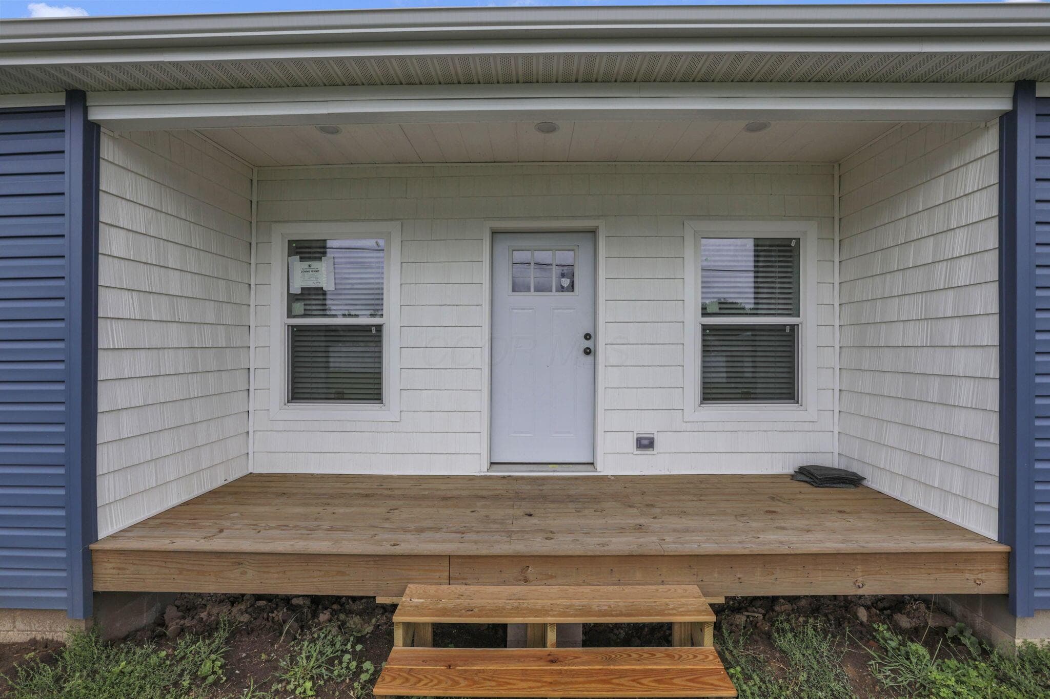 Covered porch with wood decking