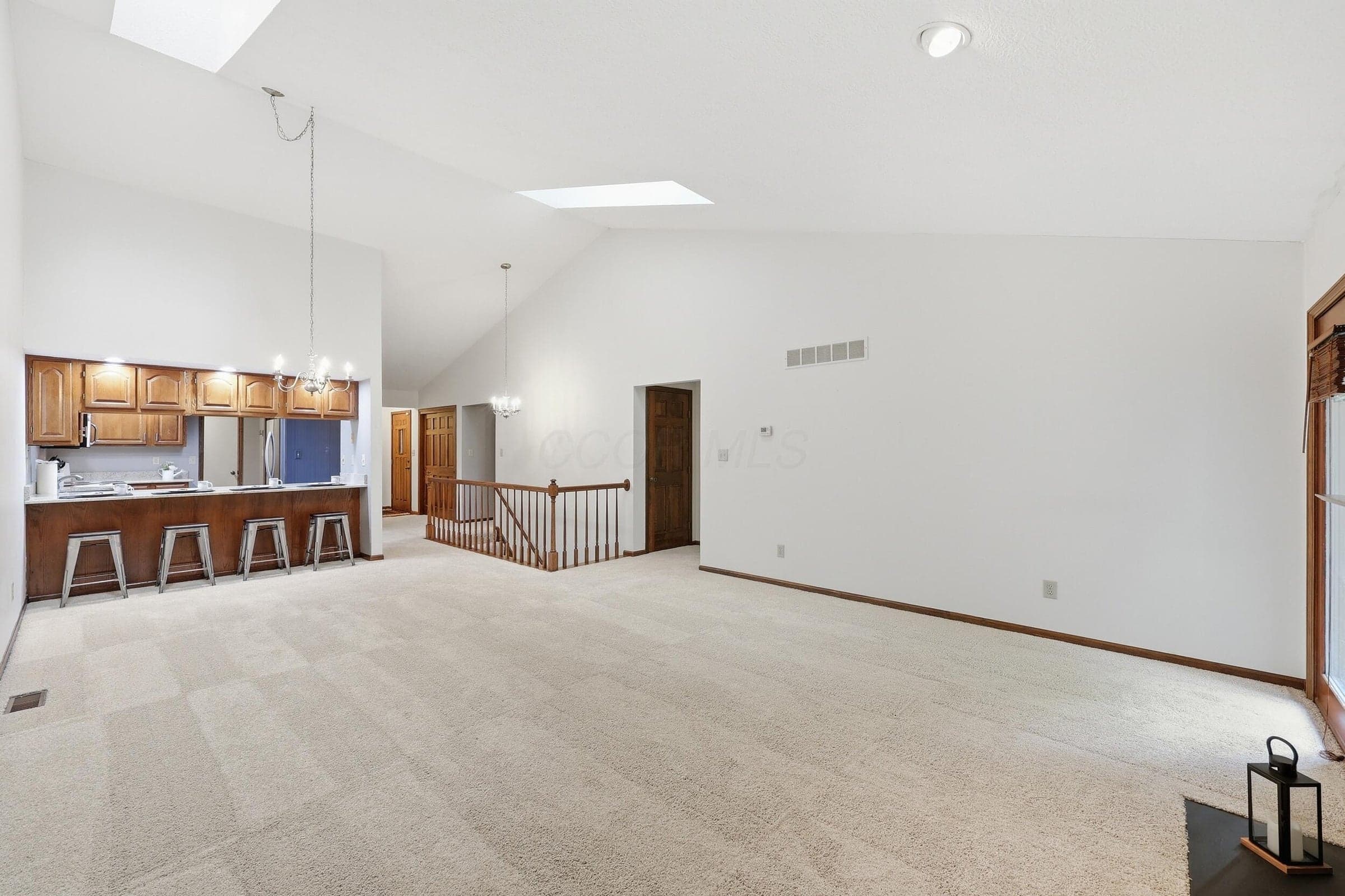 Vaulted ceilings with skylights, new carpet and breakfast bar area