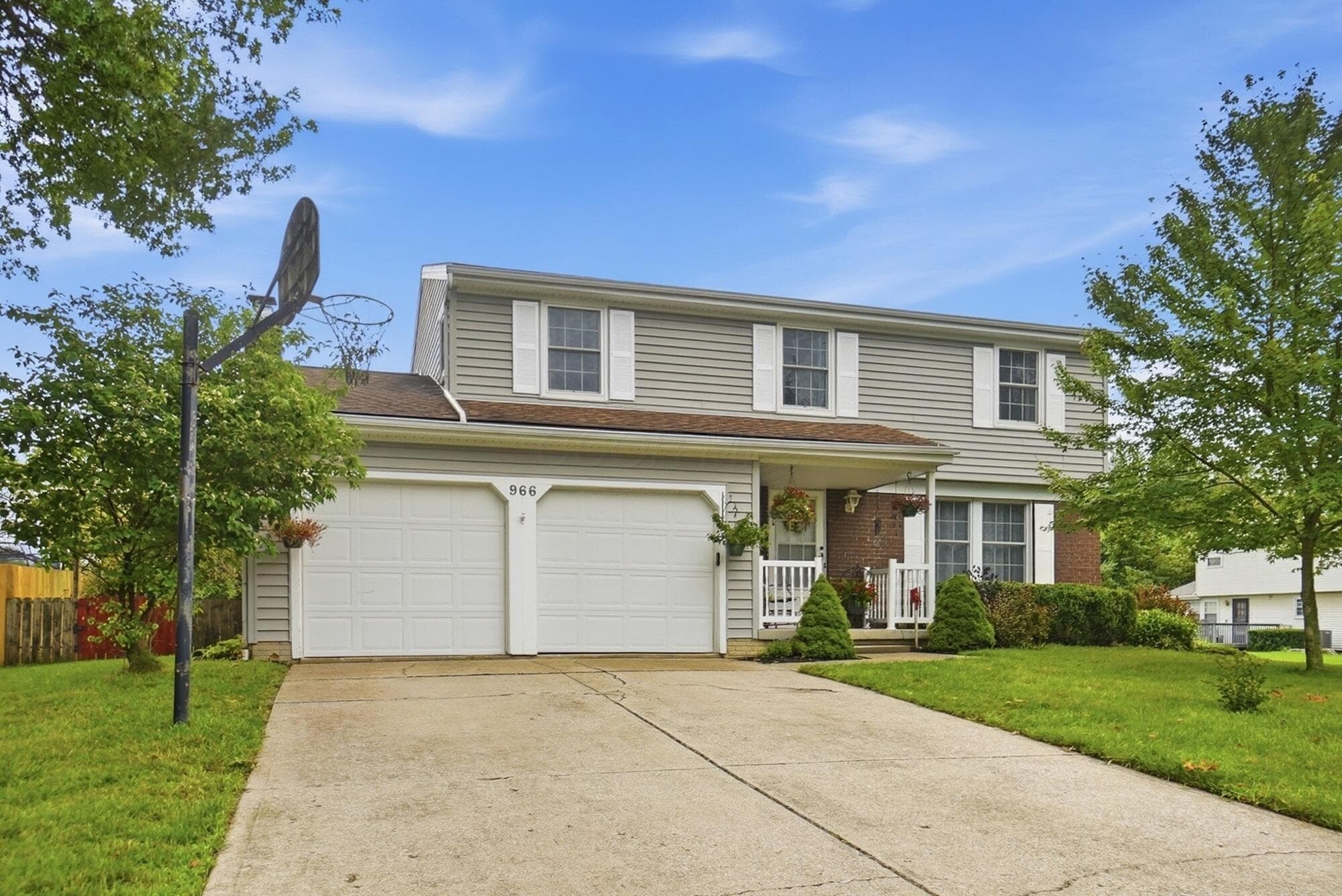 Two car garage + room to park additional cars on driveway