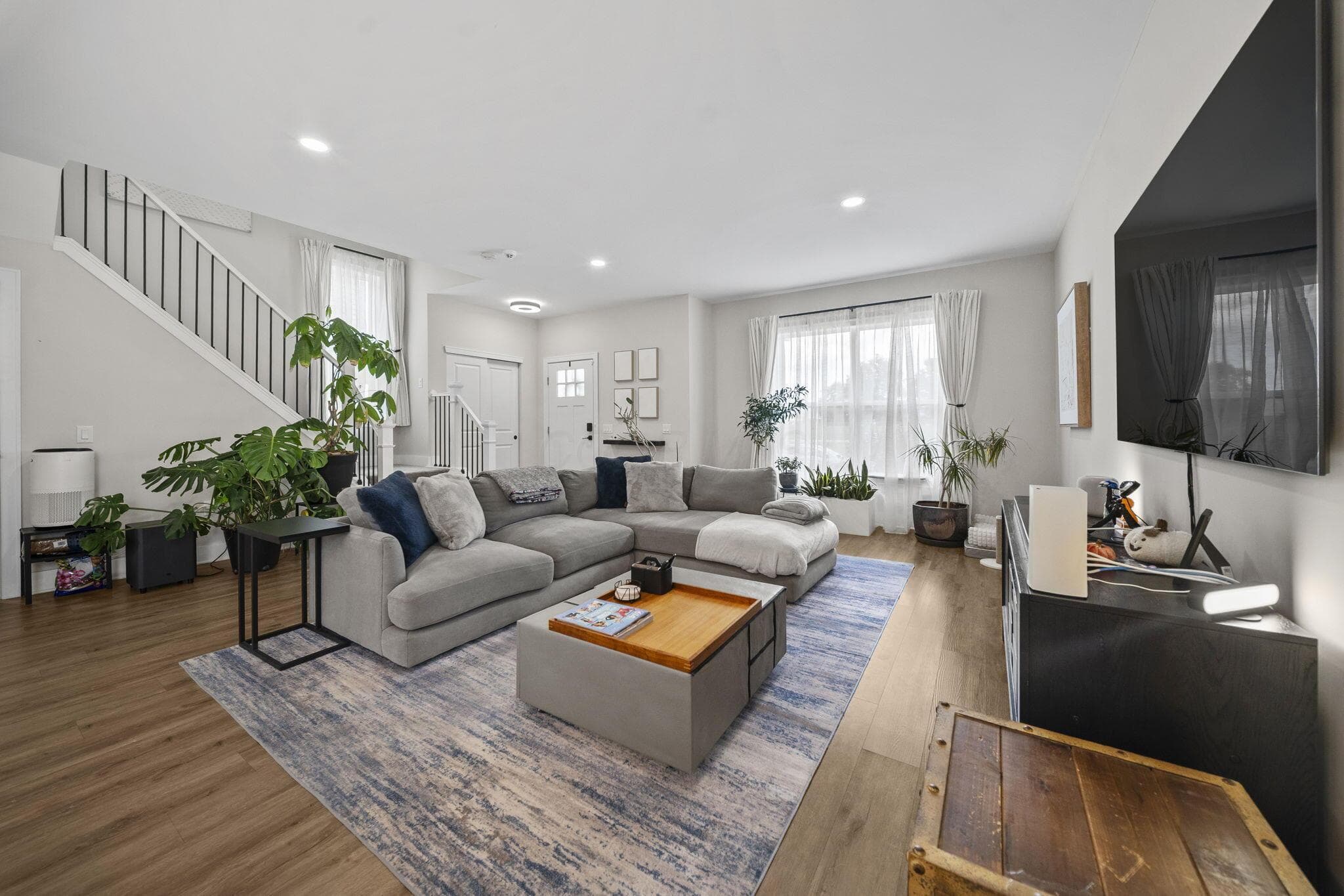 So much natural light! This room provides many options for your style of living!