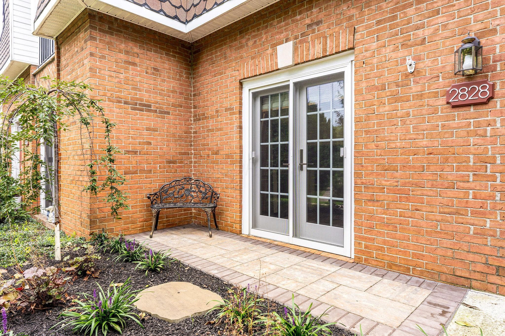 French doors open to kitchen