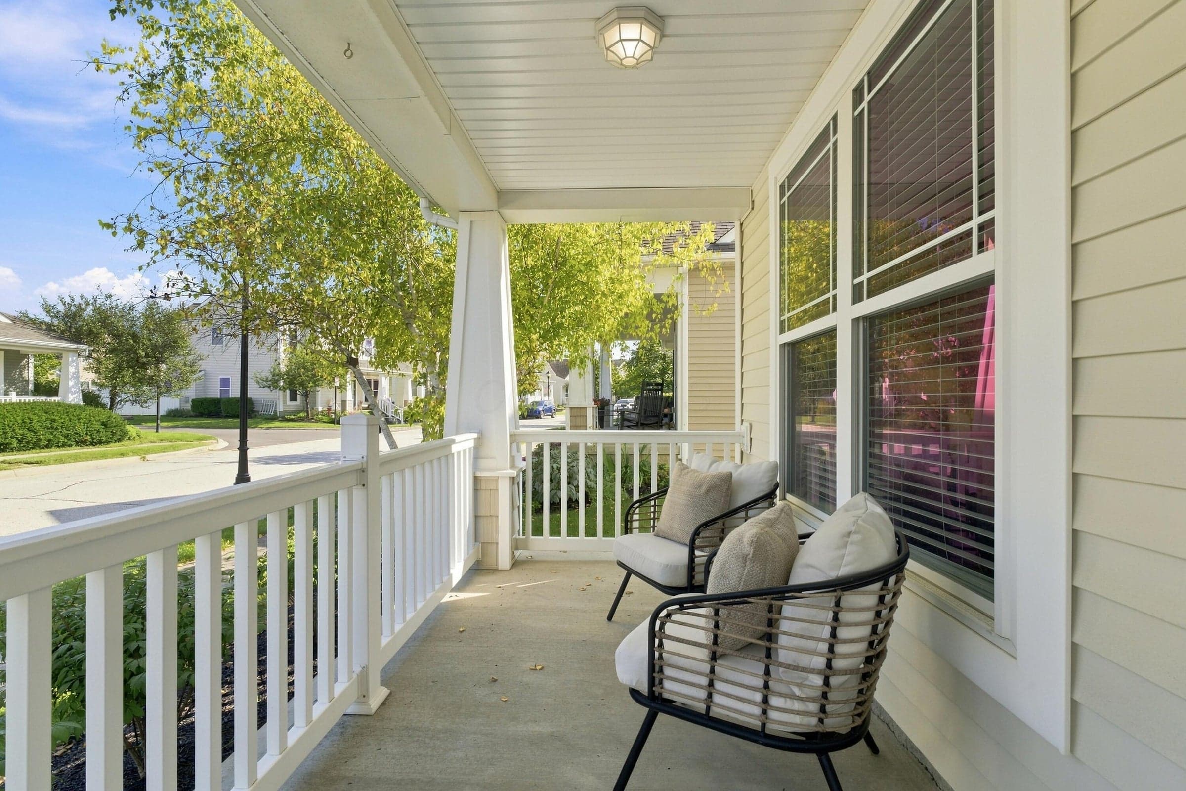 Expansive Covered Front Porch is perfect for sittin' for a spell or just greeting neighbors!