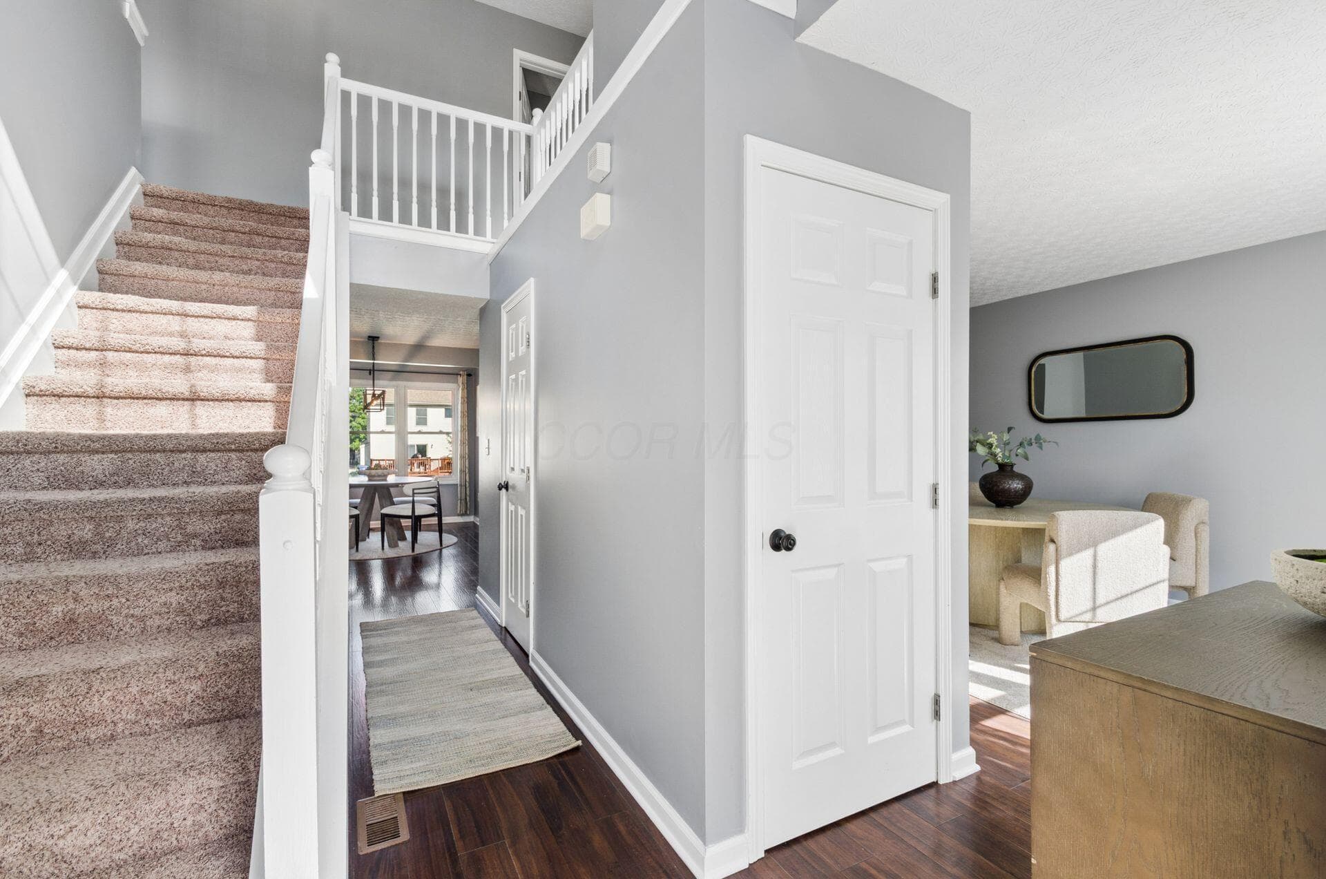 Double height Front Entry with windows for all day light.