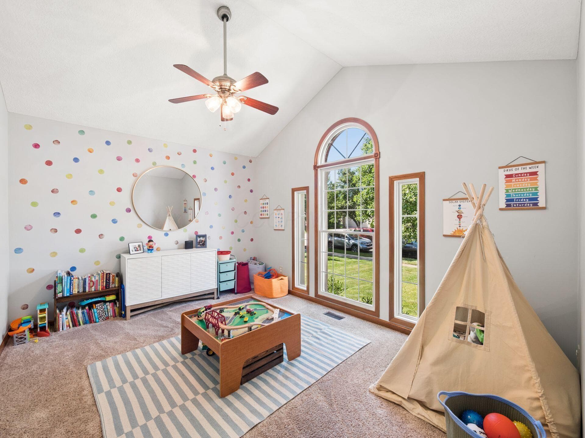 Vaulted office/ flex room with large windows