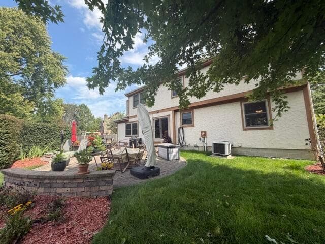 Back of the home and beautiful Paver Patio.