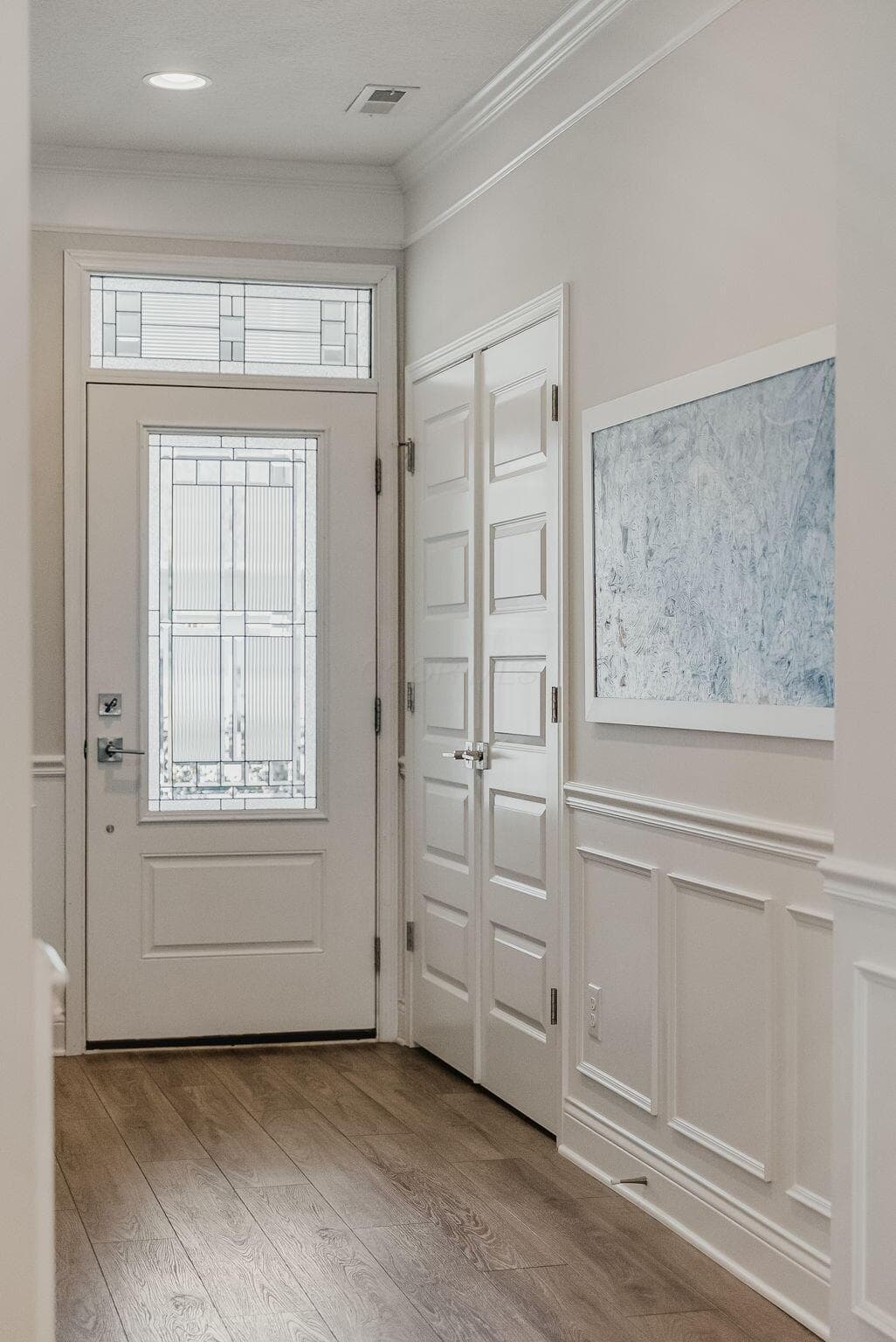 Upgraded glass entry door welcomes you home