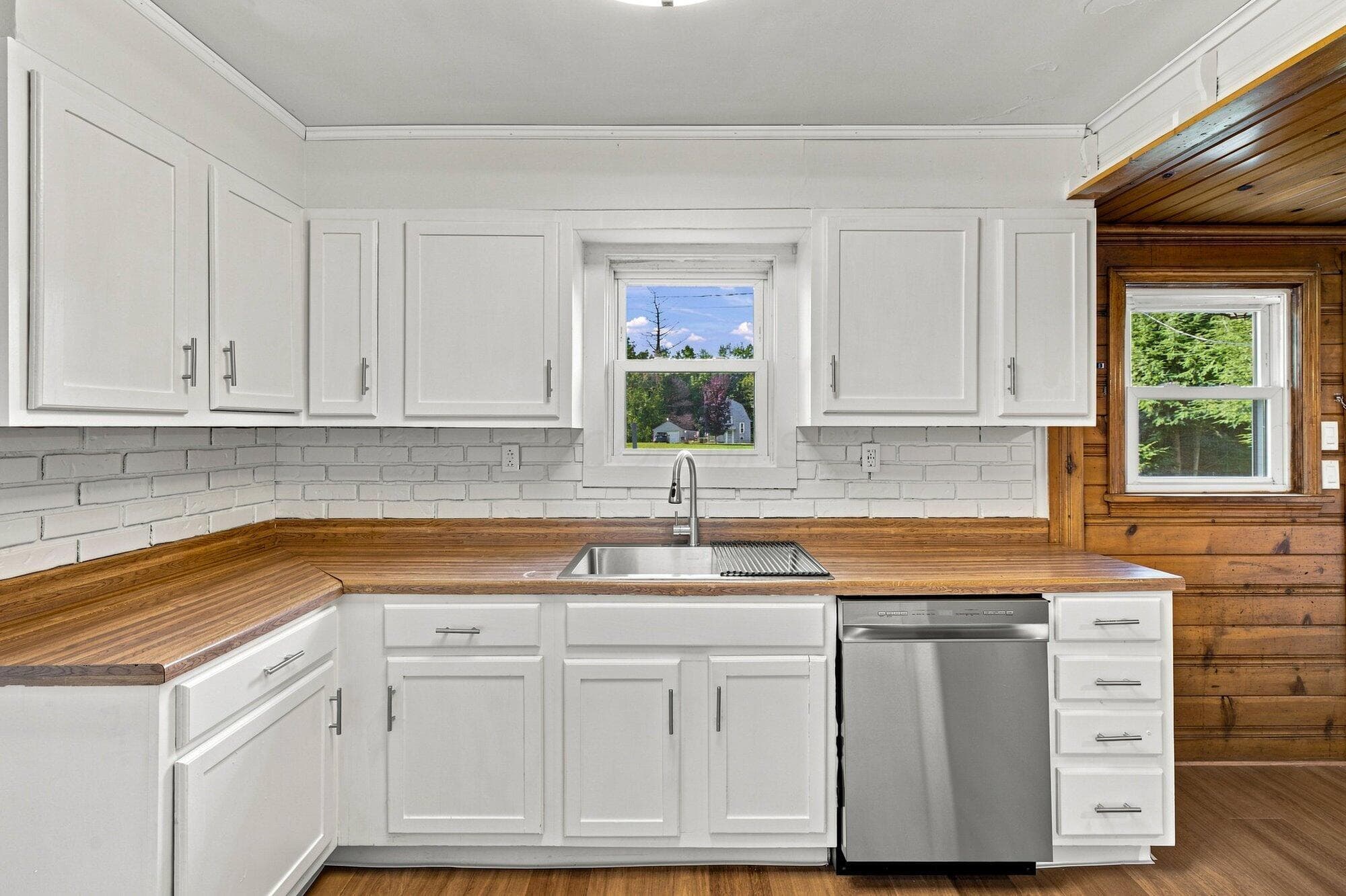 White cabinetry with brushed nickel hardware