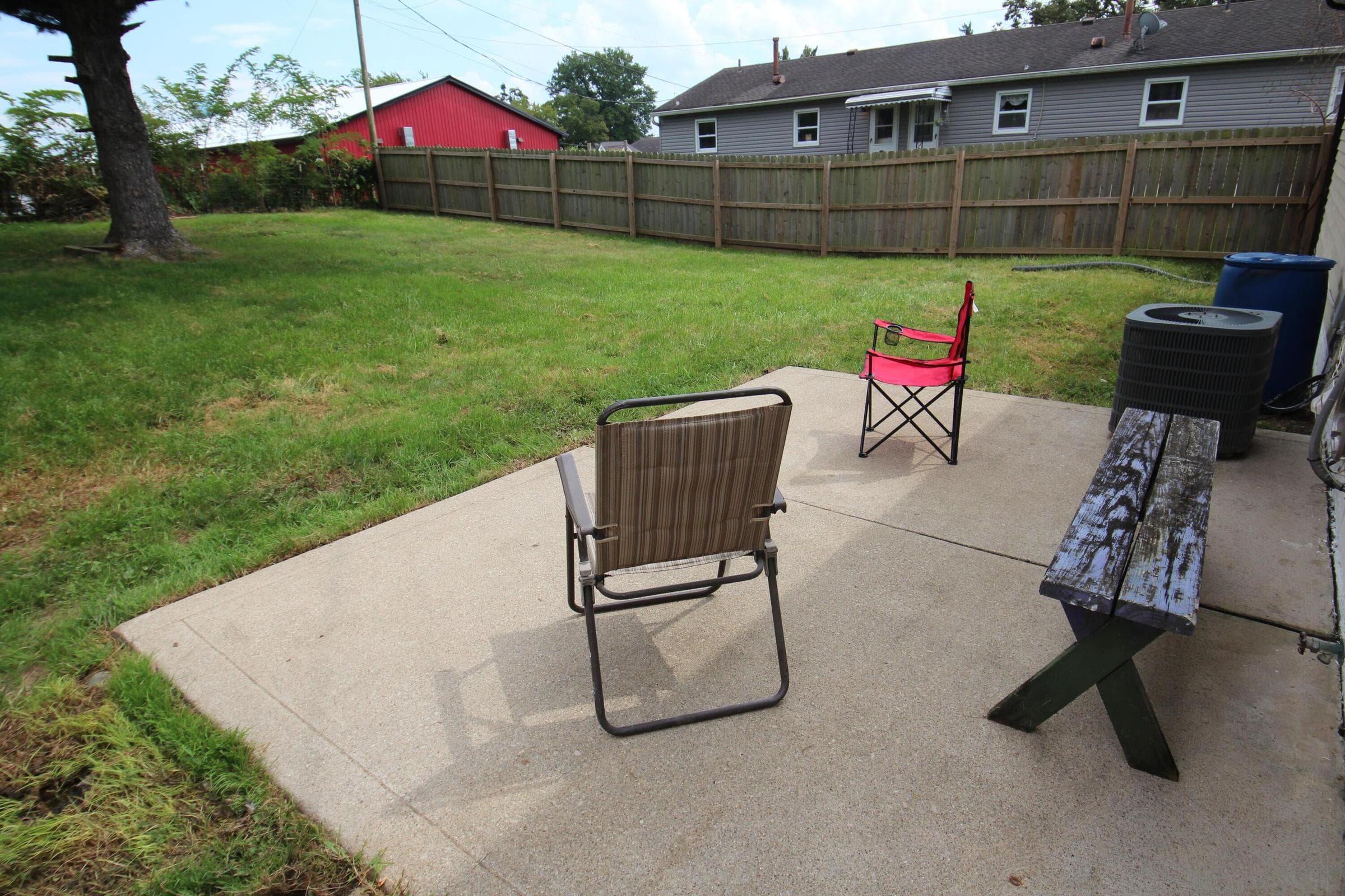 large back yard with privacy fence