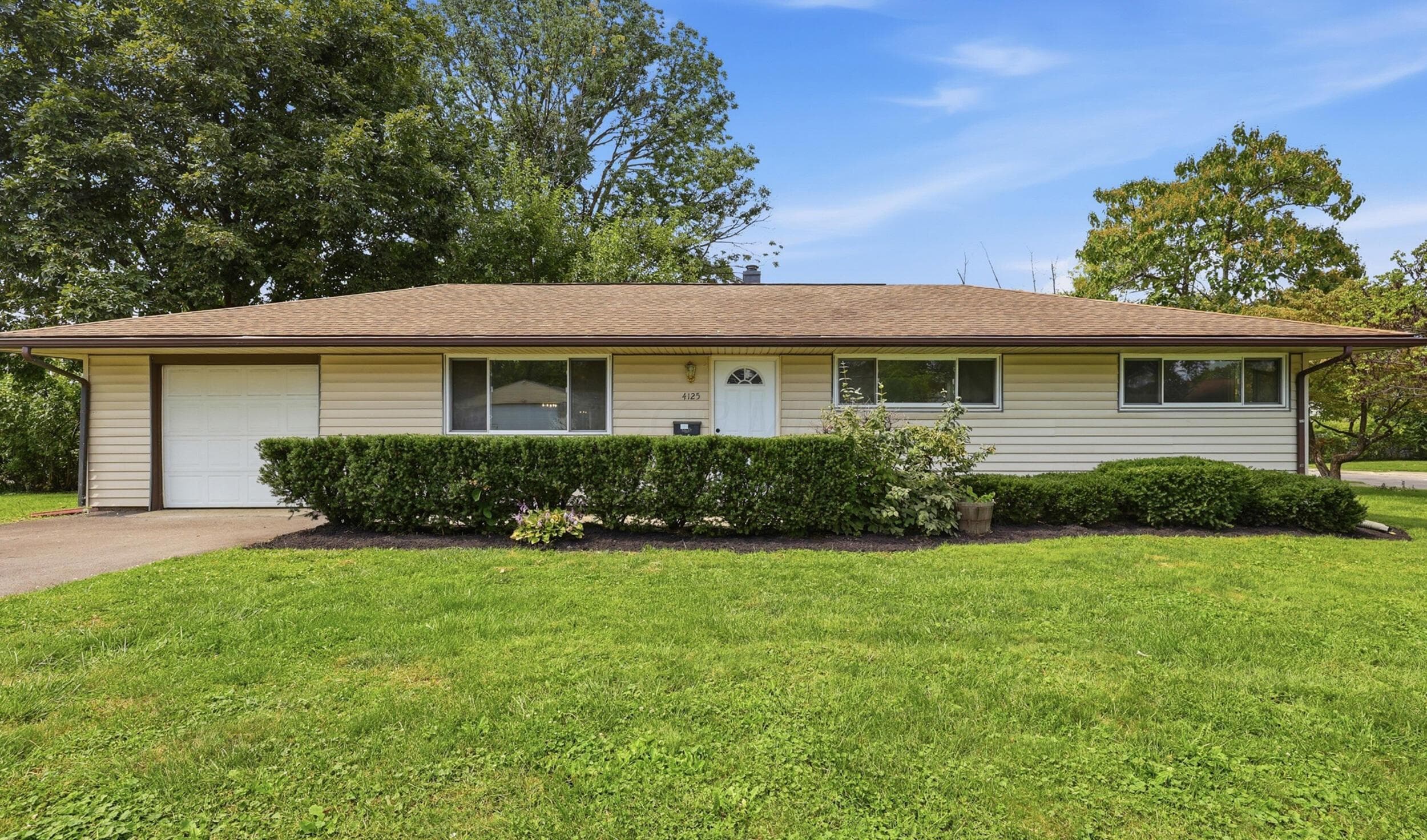 This beautifully maintained home welcomes everyone to come on in.
