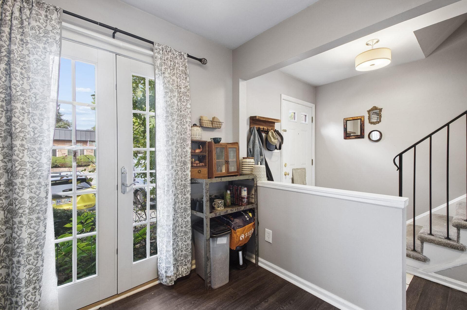 French doors lead to front gardens.