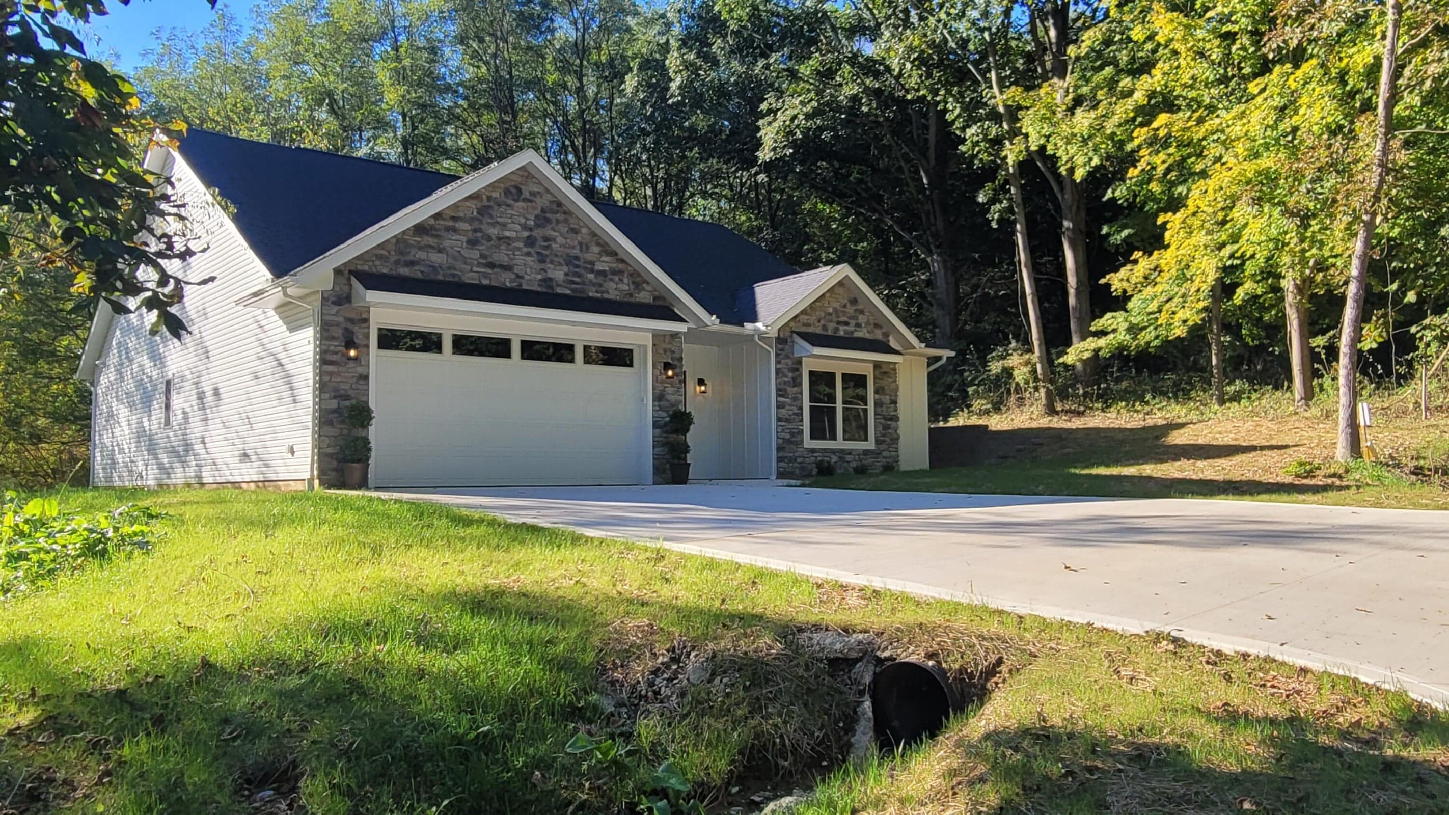 NEW CONCRETE AND GRASS GROWING!