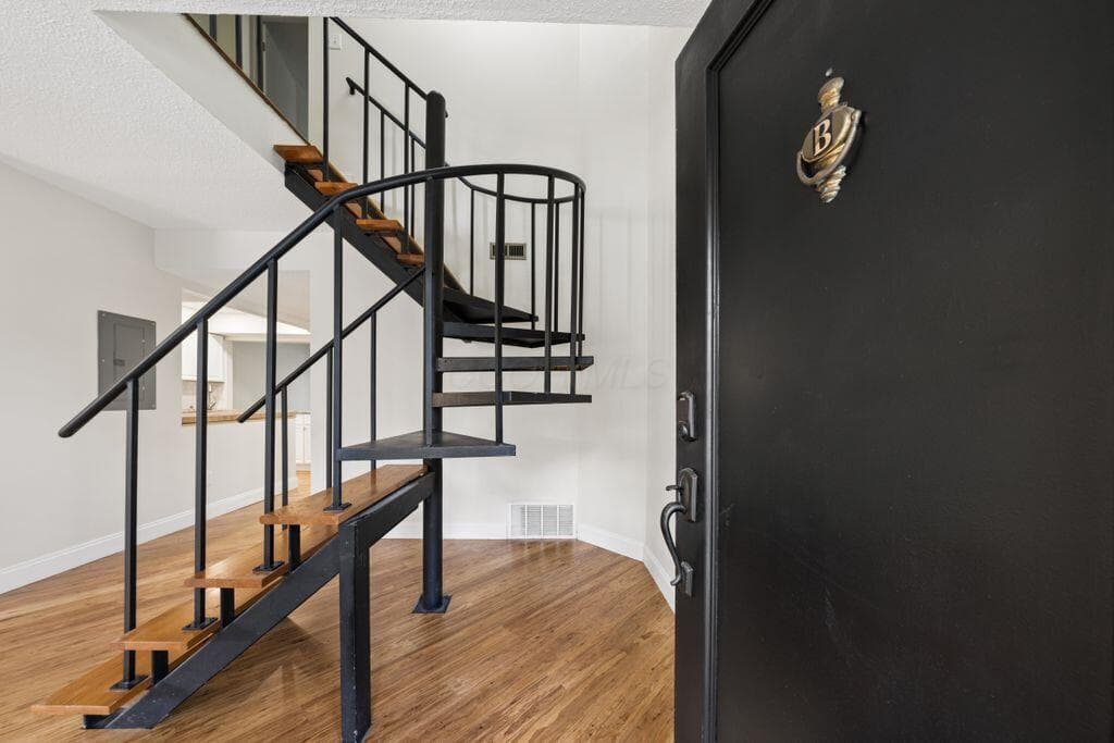 Spiral staircase greets you upon entry!