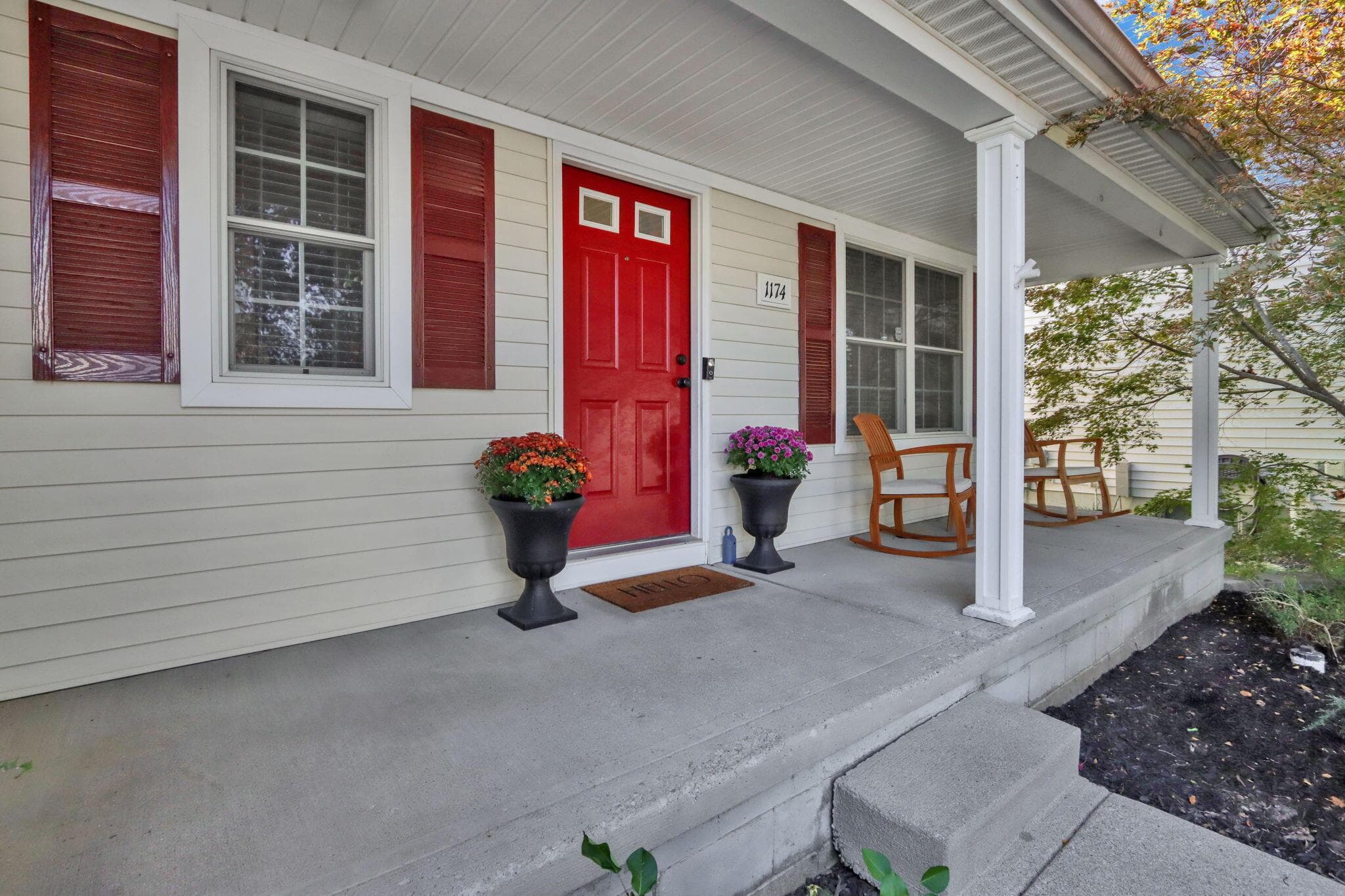 Inviting front porch is the perfect place to catch up with a neighbor or take your morning coffee!