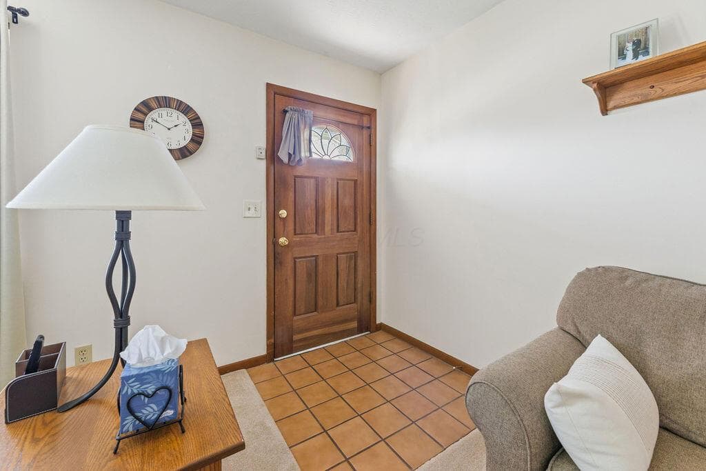 • Ceramic tile flooring • Ivory painted walls • Open to Living Room