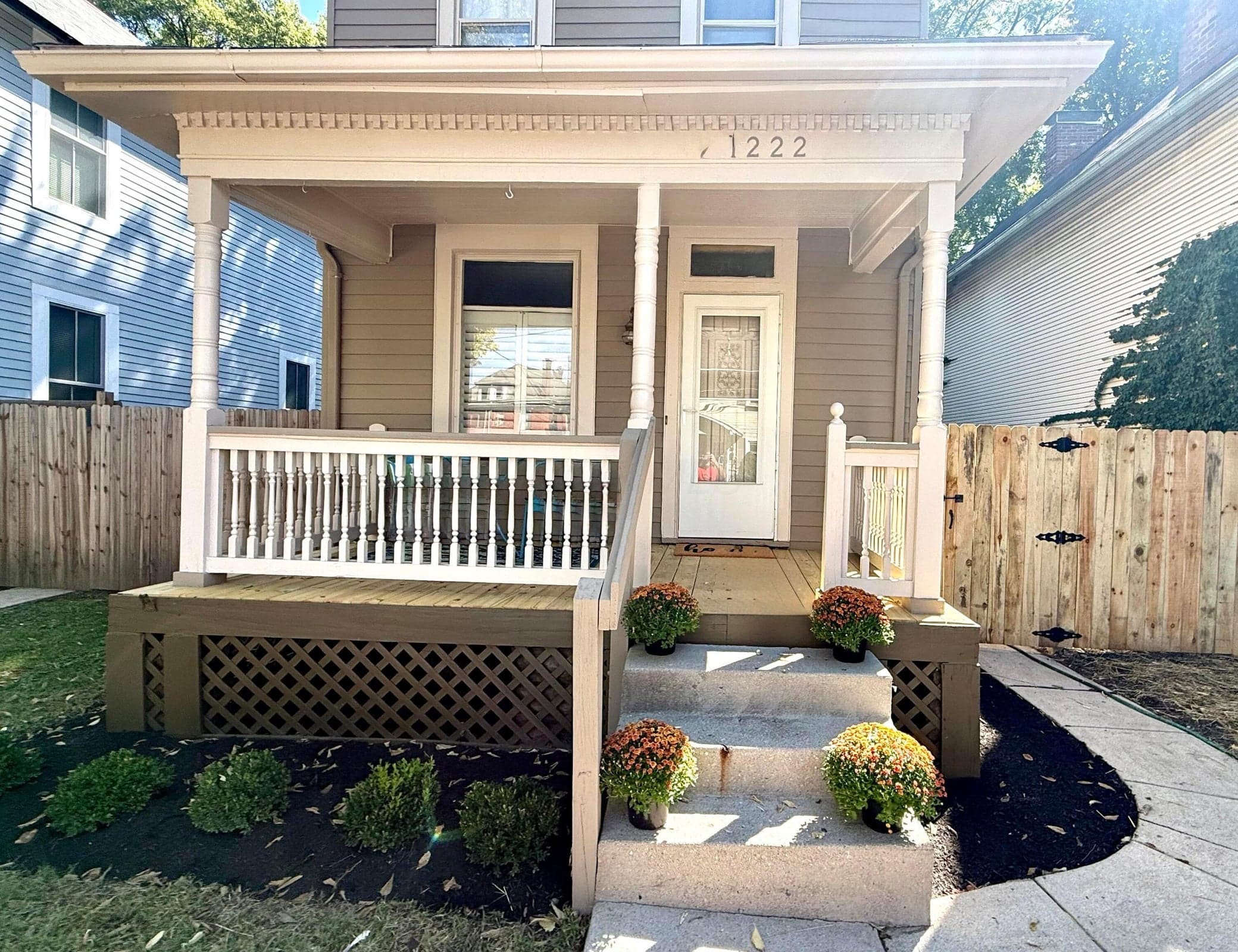 Newly updated front porch with new flooring and paint