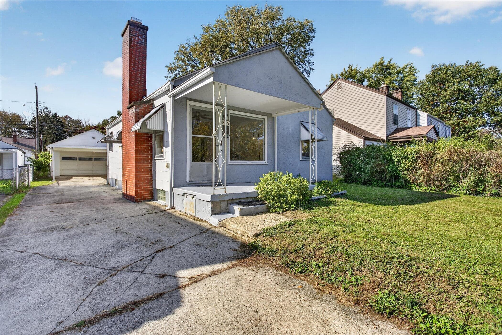 2- Car garage and 2-Car Carport.